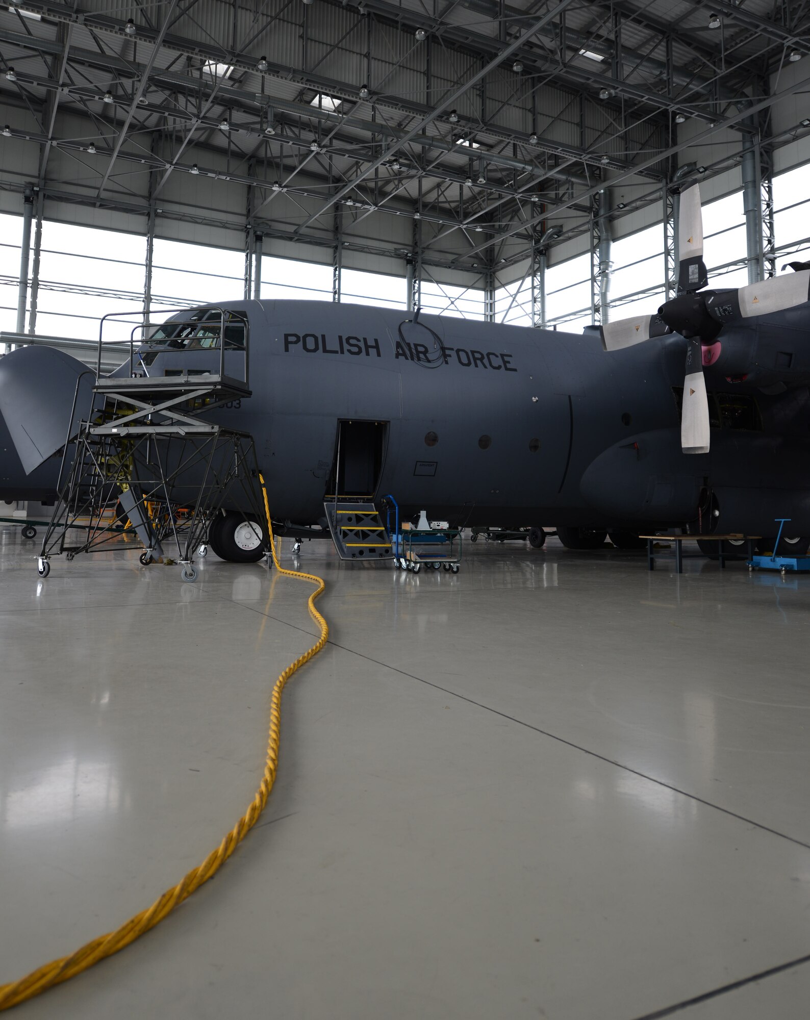 A Polish air force C-130 Hercules sits in a hangar for maintanence June 17, 2014, on Powidz Air Base, Poland. The Polish air force operates five C-130s from this installation. (U.S. Air Force photo/Airman 1st Class Kyla Gifford/Released)