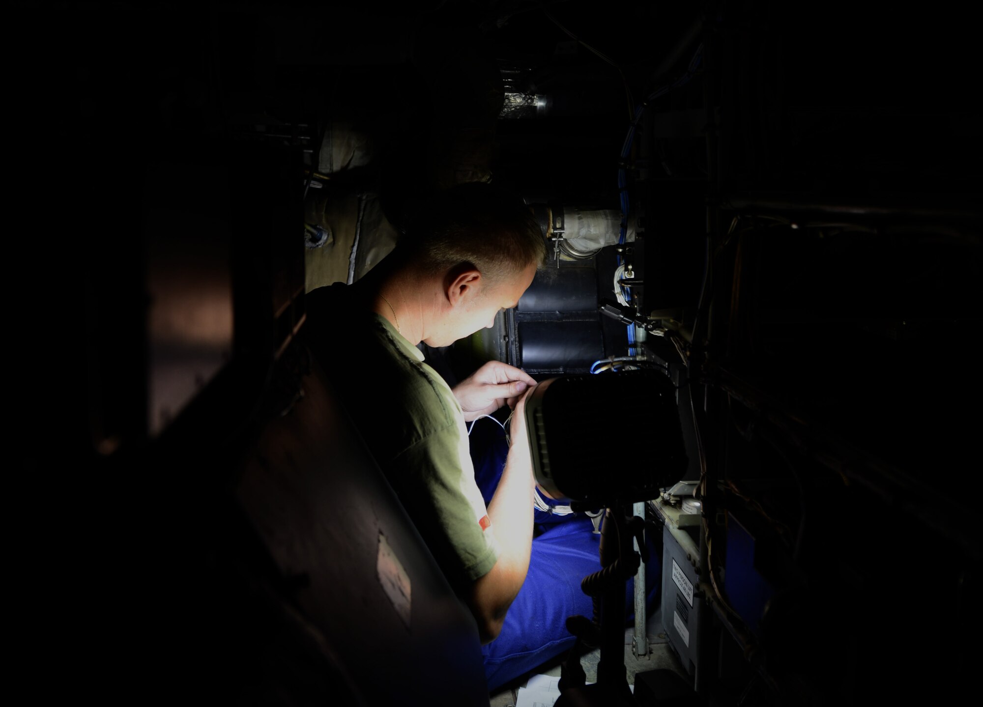 A Polish air force maintainer works on a C-130 Hercules June 17, 2014, on Powidz Air Base, Poland. The Polish air force operates five C-130s from this installation. (U.S. Air Force photo/Airman 1st Class Kyla Gifford/Released)