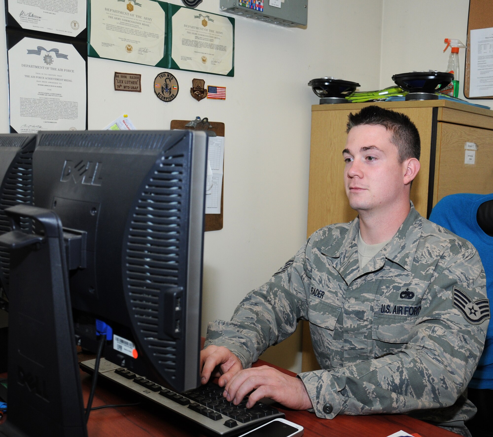 U.S. Air Force Staff Sgt. Ryin Rader, 100th Logistics Readiness Squadron NCO in charge of equipment support from Keyser, W.Va., ensures his section is compliant with all safety regulations, and issues out equipment required to complete the mission June 13, 2014, on RAF Mildenhall, England. Within Rader’s Air Force specialty code, there are several positions that he can be in including equipment support. He assists his colleagues with acquiring equipment and supplies, as well as making sure personnel have a safe working environment. (U.S. Air Force photo/Gina Randall/Released)