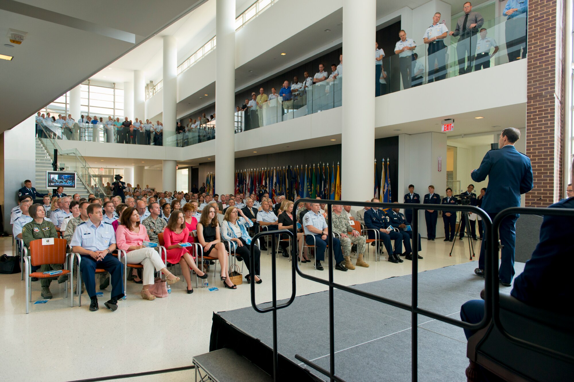Lt. Gen. Stanley E. Clarke III, the director of the Air National Guard delivers his welcome remarks during an assumption of command ceremony at the Air National Guard Readiness Center, June 16, 2014, Joint Base Andrews, Md. Brig. Gen. Michael R. Taheri, commander of the ANGRC assumes command from Lt. Gen. Clarke. The ANGRC ensures ANG field units are properly resourced to train and equip in support of the state and federal missions across the entire spectrum of military operations and provide support sustaining ANG Airmen throughout their careers. (Air National Guard photo by Master Sgt. Marvin Preston/Released)
