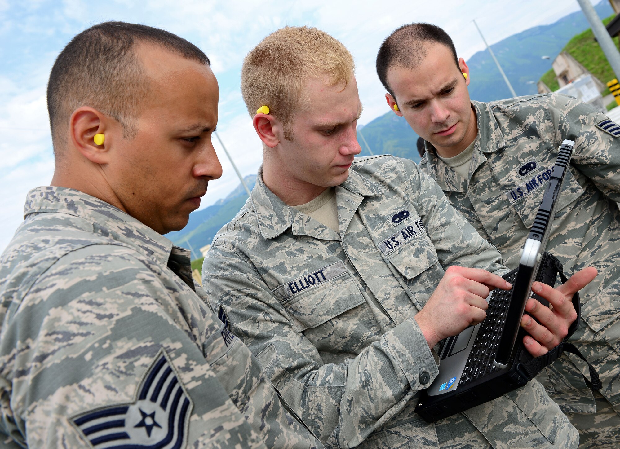 (From left) Tech. Sgt. Anthony Rivera, Senior Airman Lucas Elliot and Staff Sgt. Edward Lewis, 31st Munitions Squadron inspectors, review a munition’s serial number, June 12, 2014, at Aviano Air Base, Italy. The 31st MUNS Materiel Flight oversees the storage, maintenance, delivery, safety and overall serviceability of munitions used by various units as well as U.S. and NATO operations. (U.S. Air Force photo/Senior Airman Matthew Lotz)