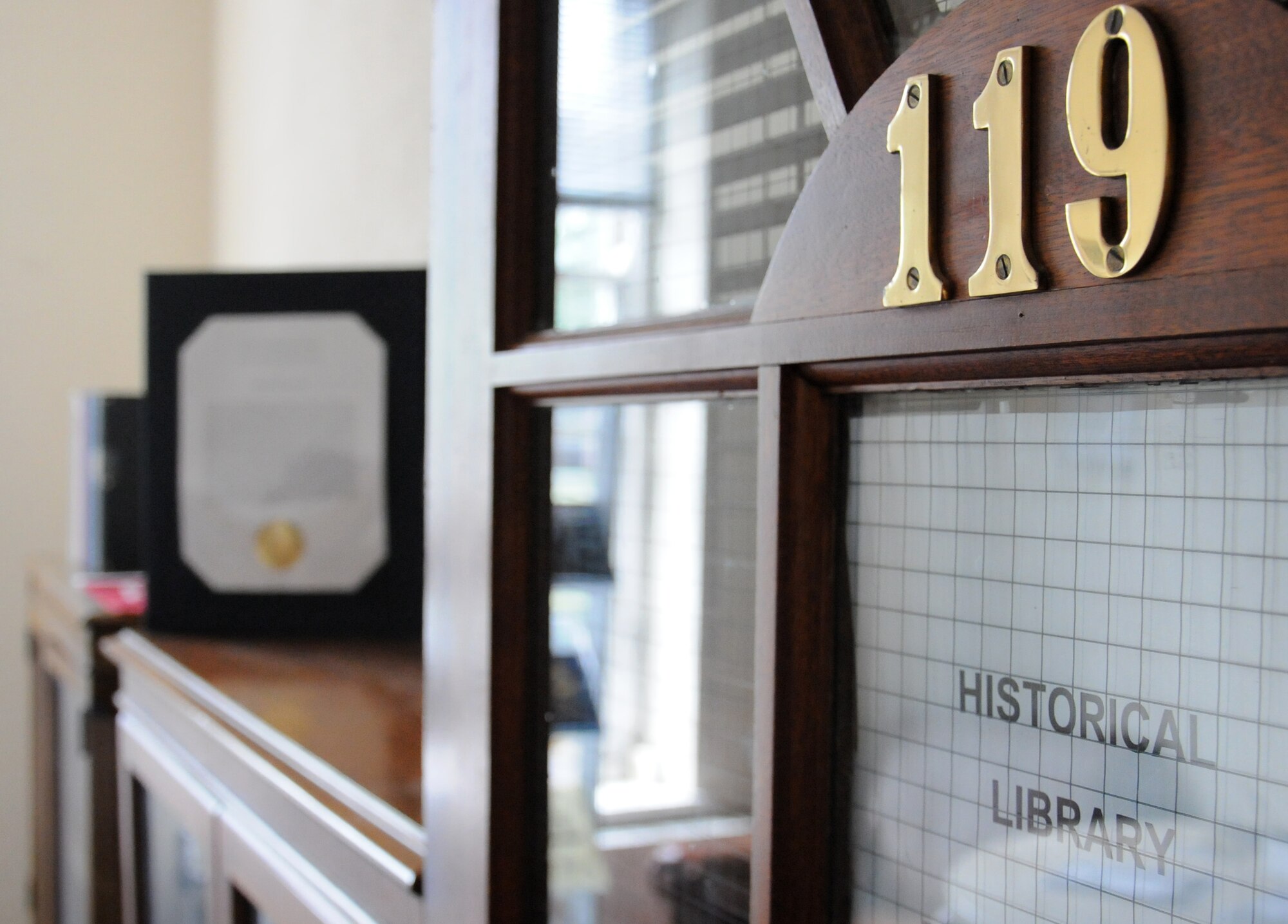 A new historical library is ready for use June 11, 2014, on RAF Mildenhall, England. U.S. Air Force Col. Daniel Merry, 100th Mission Support Group commander, and Mark Howell, 100th Air Refueling Wing historian from Odessa, Texas, pooled their book resources and created a historical library for the base population. (U.S. Air Force photo/Gina Randall/Released)