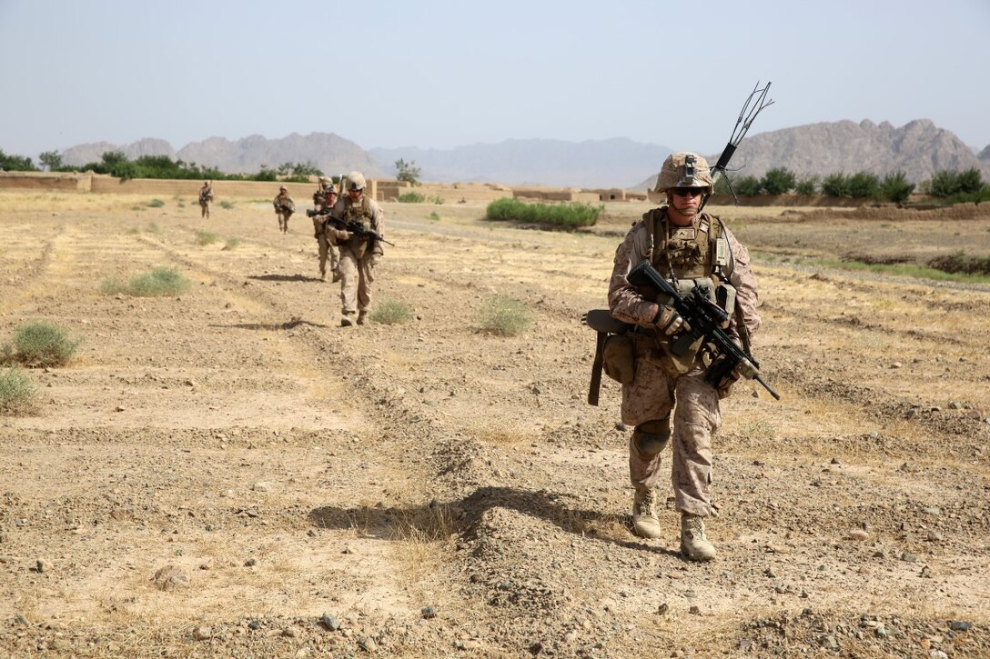 Marines with Bravo Company, 1st Battalion, 7th Marine Regiment, conduct a security patrol during a mission in Helmand province, Afghanistan, June 5, 2014. The company conducted disruption operations in a known Taliban bed-down location for two days. During the previous mission May 29, the company discovered a drug production lab and removed more than one metric ton of narcotics from the battlefield.
(U.S. Marine Corps photo by Cpl. Joseph Scanlan / released)
