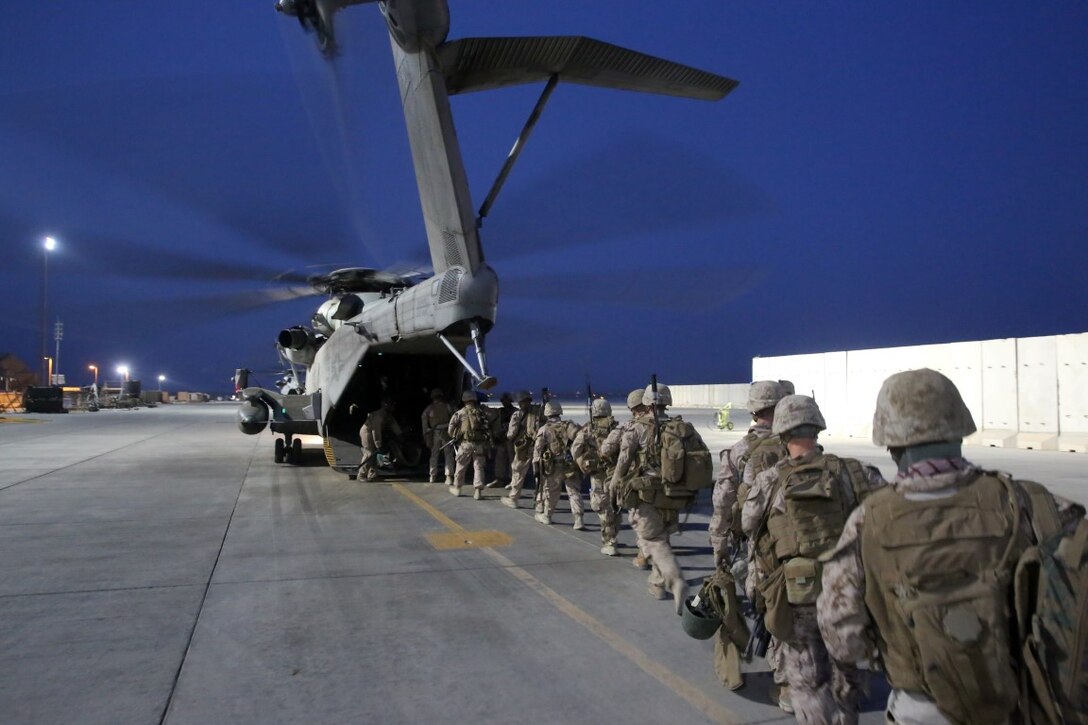 Marines with Bravo Company, 1st Battalion, 7th Marine Regiment, load onto a CH-53E Super Stallion with Marine Heavy Helicopter Squadron 466 prior to a mission in Helmand province, Afghanistan, June 5, 2014. The company conducted disruption operations in a known Taliban bed-down location for two days. During the previous mission May 29, the company discovered a drug production lab and removed more than one metric ton of narcotics from the battlefield.
(U.S. Marine Corps photo by Cpl. Joseph Scanlan / released)
