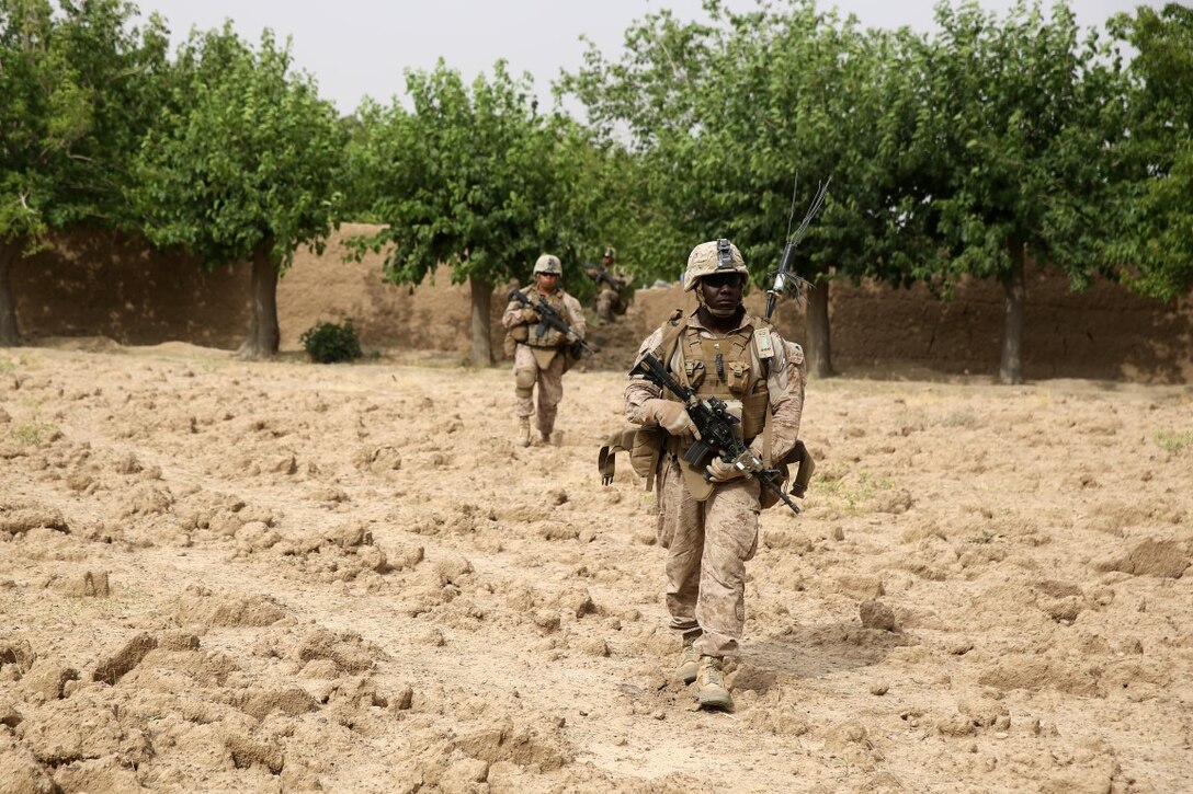 Corporal Kenslor Derival, a rifleman with Bravo Company, 1st Battalion, 7th Marine Regiment, and a native of Hollis, New York, waits anxiously inside a CH-53E Super Stallion while being transported to an objective during a mission in Helmand province, Afghanistan, June 6, 2014. The company conducted disruption operations in a known Taliban bed-down location for two days. During the previous mission May 29, the company discovered a drug production lab and removed more than one metric ton of narcotics from the battlefield.
(U.S. Marine Corps photo by Cpl. Joseph Scanlan / released)
