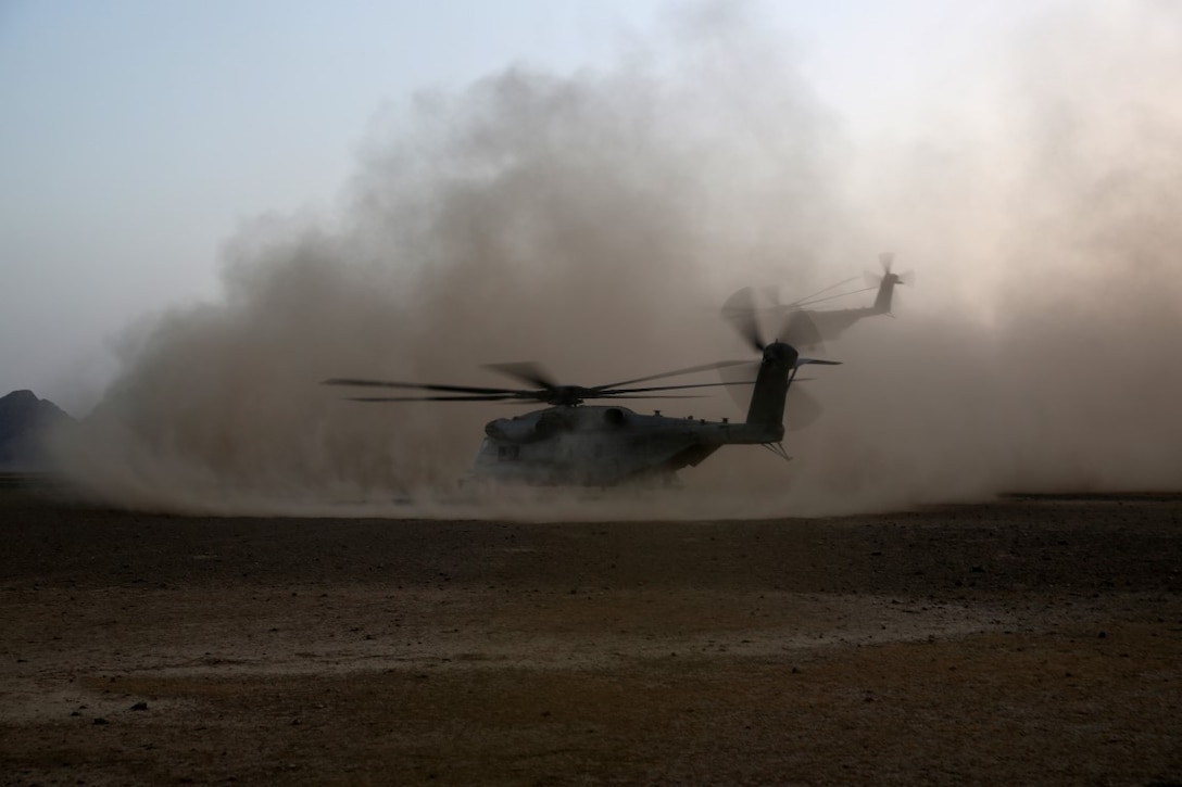CH-53E Super Stallions with Marine Heavy Helicopter Squadron 466 take off after transporting Marines with Bravo Company, 1st Battalion, 7th Marine Regiment, during a mission in Helmand province, Afghanistan, June 5, 2014. The company conducted disruption operations in a known Taliban bed-down location for two days. During the previous mission May 29, the company discovered a drug production lab and removed more than one metric ton of narcotics from the battlefield.
(U.S. Marine Corps photo by Cpl. Joseph Scanlan / released)
