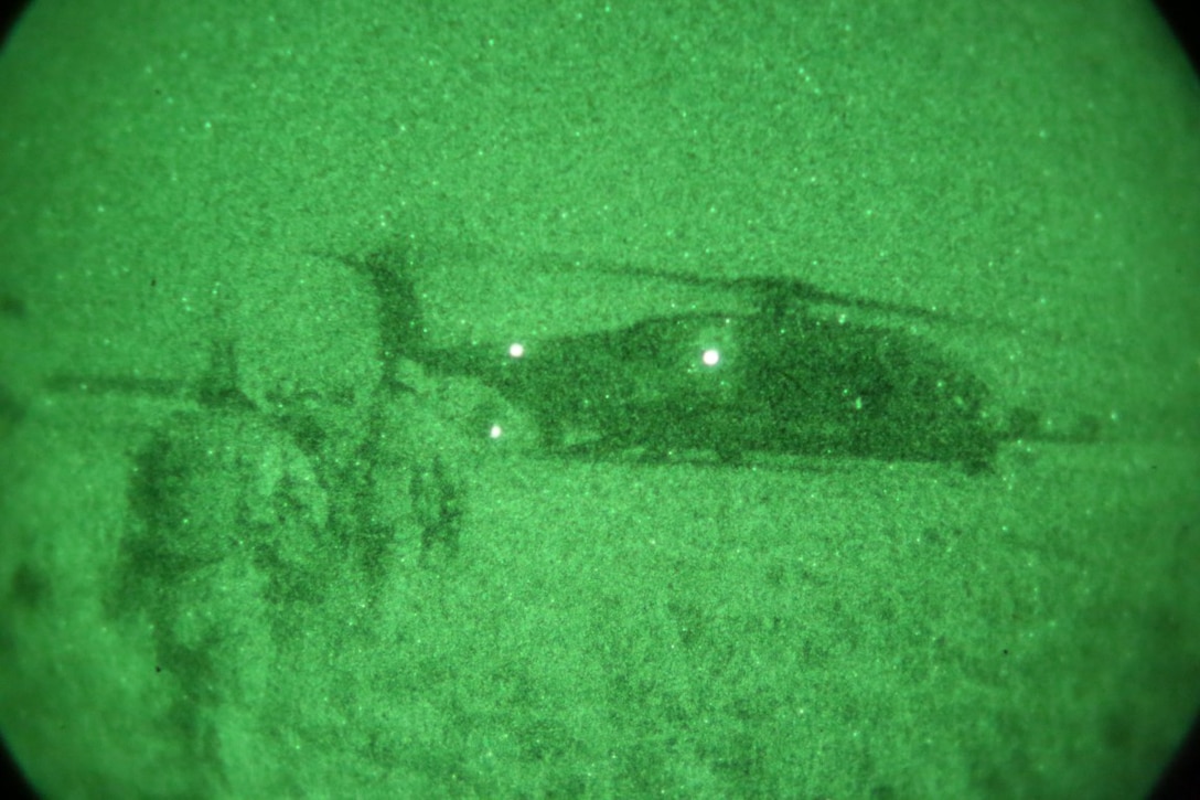 Marines with Bravo Company, 1st Battalion, 7th Marine Regiment, load onto a CH-53E Super Stallion with Marine Heavy Helicopter Squadron 466 to extract from the area after a mission in Helmand province, Afghanistan, June 6, 2014. The company conducted disruption operations in a known Taliban bed-down location for two days. During the previous mission May 29, the company discovered a drug production lab and removed more than one metric ton of narcotics from the battlefield.
(U.S. Marine Corps photo by Cpl. Joseph Scanlan / released)
