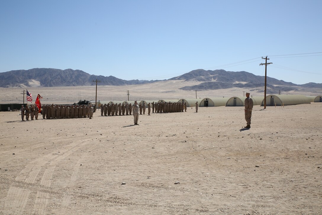 Maj. Gen. Paul Brier stands before the Marines of 4th Marine Division after assuming command during the Integrated Training Exercise 4-14 aboard Marine Corps Air Ground Combat Center Twentynine Palms, Calif., June 18, 2014. Before taking command from Maj. Gen. James Hartsell, Brier served as the assistant deputy commandant for plans, policies and operations at Headquarters Marine Corps.
