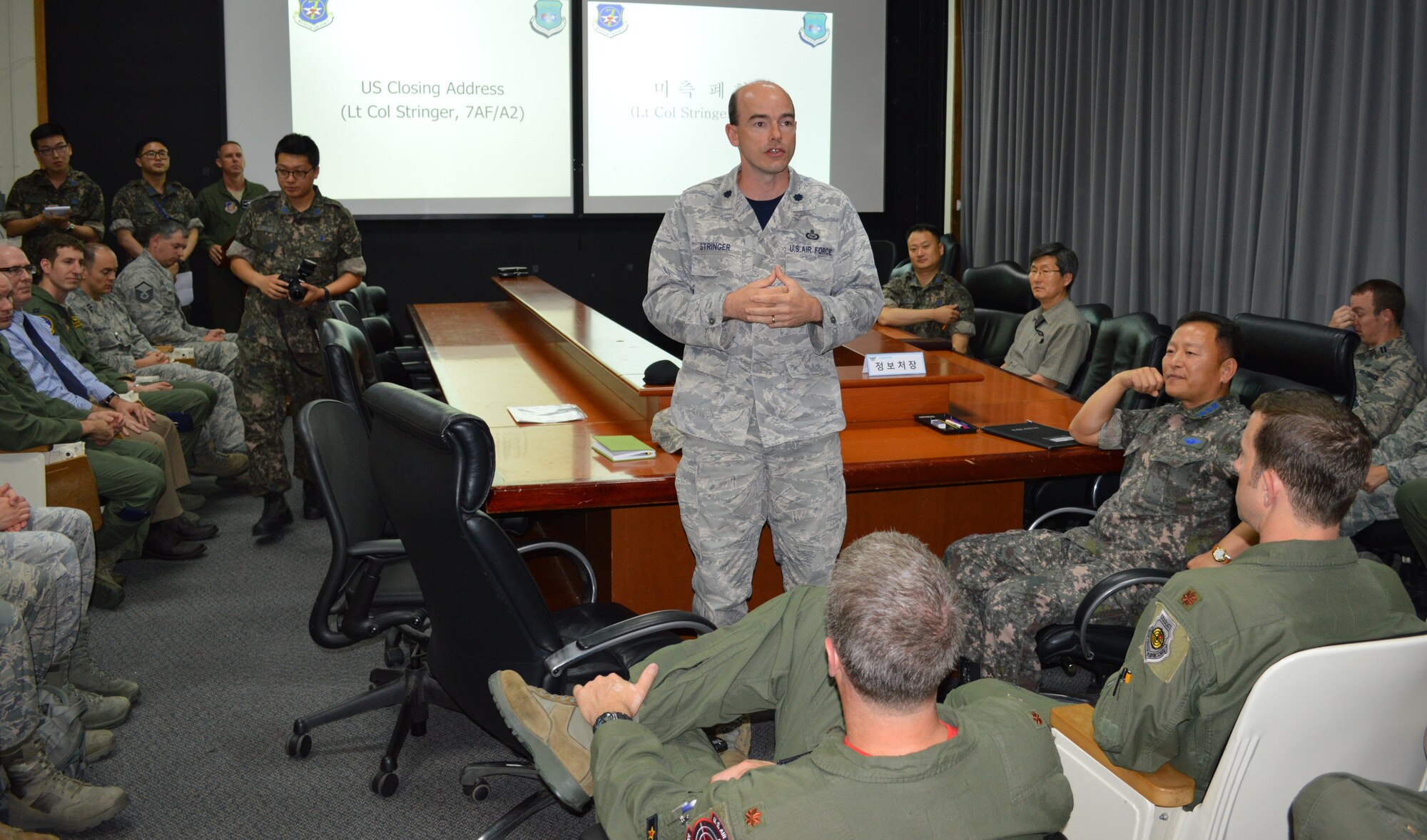 OSAN AIR BASE, Republic of Korea - Lt. Col. David Stringer, 7th Air Force A2 Deputy Director, gives closing comments on the last day of the Korean Tactics Analysis Team Conference and Working Group on Osan Air Base, Republic of Korea, June 13. The conference is held annually on the Korean peninsula to discuss and debate evolutionary changes and/or advancements in tactics over the previous year based on observations. More than 90 U.S., ROK and Australian personnel participated in this year's conference. The resulting KTAT report is approved by the 7th AF commander and published for users to reference. (U.S. Air Force photo by Tech. Sgt. Thomas J. Doscher)
