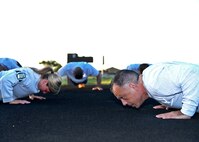 Airmen attending the Cannon AFB Airman Leadership School invited Chief
Master Sgt. Matthew Caruso, Air Force Special Operations Command command chief, to their morning physical training session June 10, 2014.  PT is such a part of Caruso's routine, especially with his rigorous travel schedule, that he plans to work
out with Air Commandos around the world. (U.S. Air Force photo/Airman 1st Class Chip Slack)
