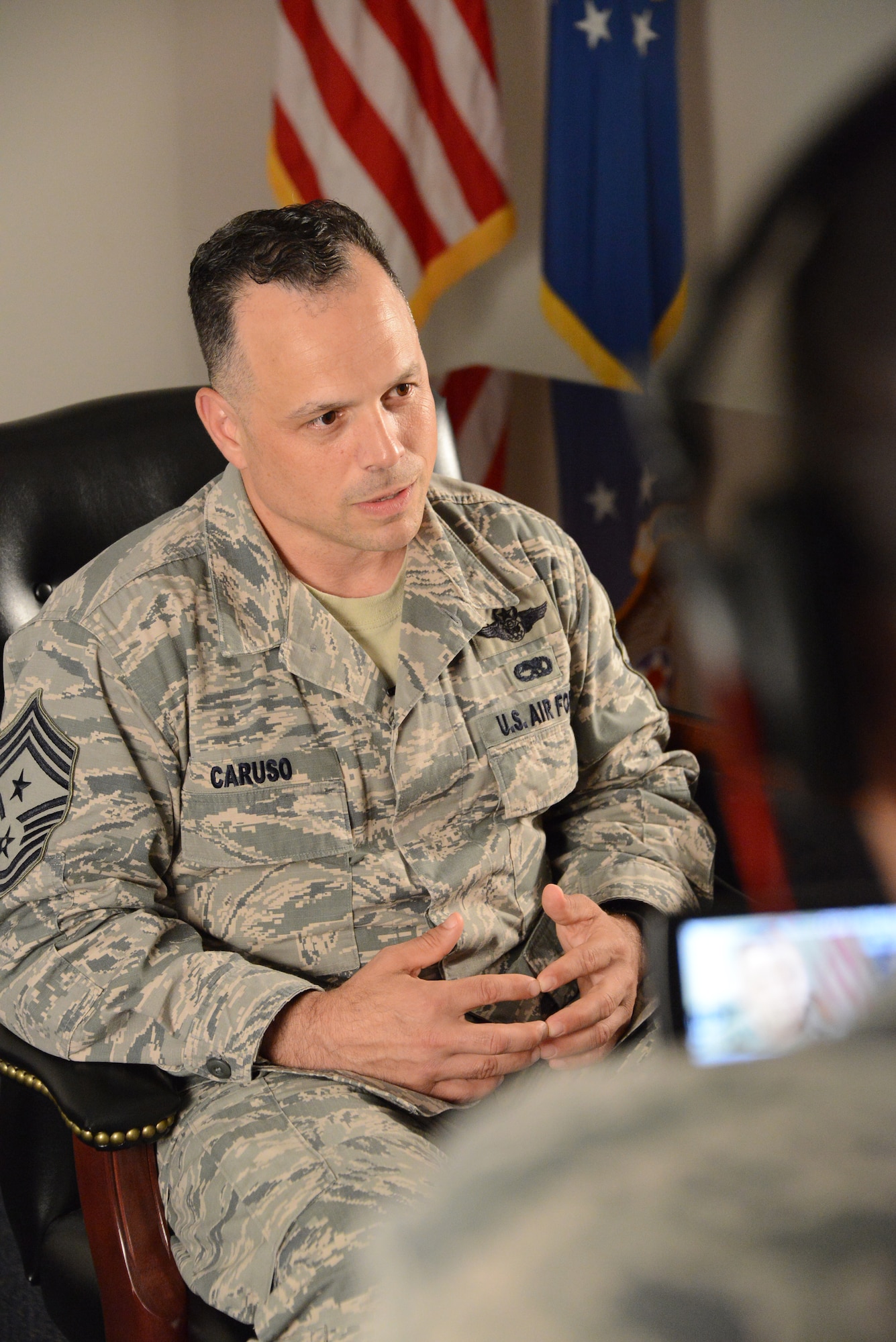 Chief Master Sgt. Matthew Caruso, the eighth Air Force Special Operations Command command chief, responds to questions May 12, 2014, in his first interview as the "senior sergeant" for the command. He returned to Hurlburt Field for his new job after recent posts at Cannon Air Force Base, N.M., and Bagram Air Base Afghanistan, and a tour in the Republic of Korea. (Air Force photo by Master Sgt. Steven Pearsall)

