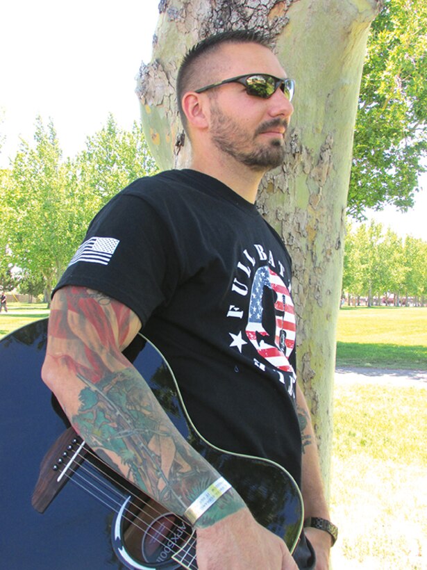 Army veteran and guitarist Robert Mitchell is the founder of Full Battle Rattle. (Photo by Ryan Stark)