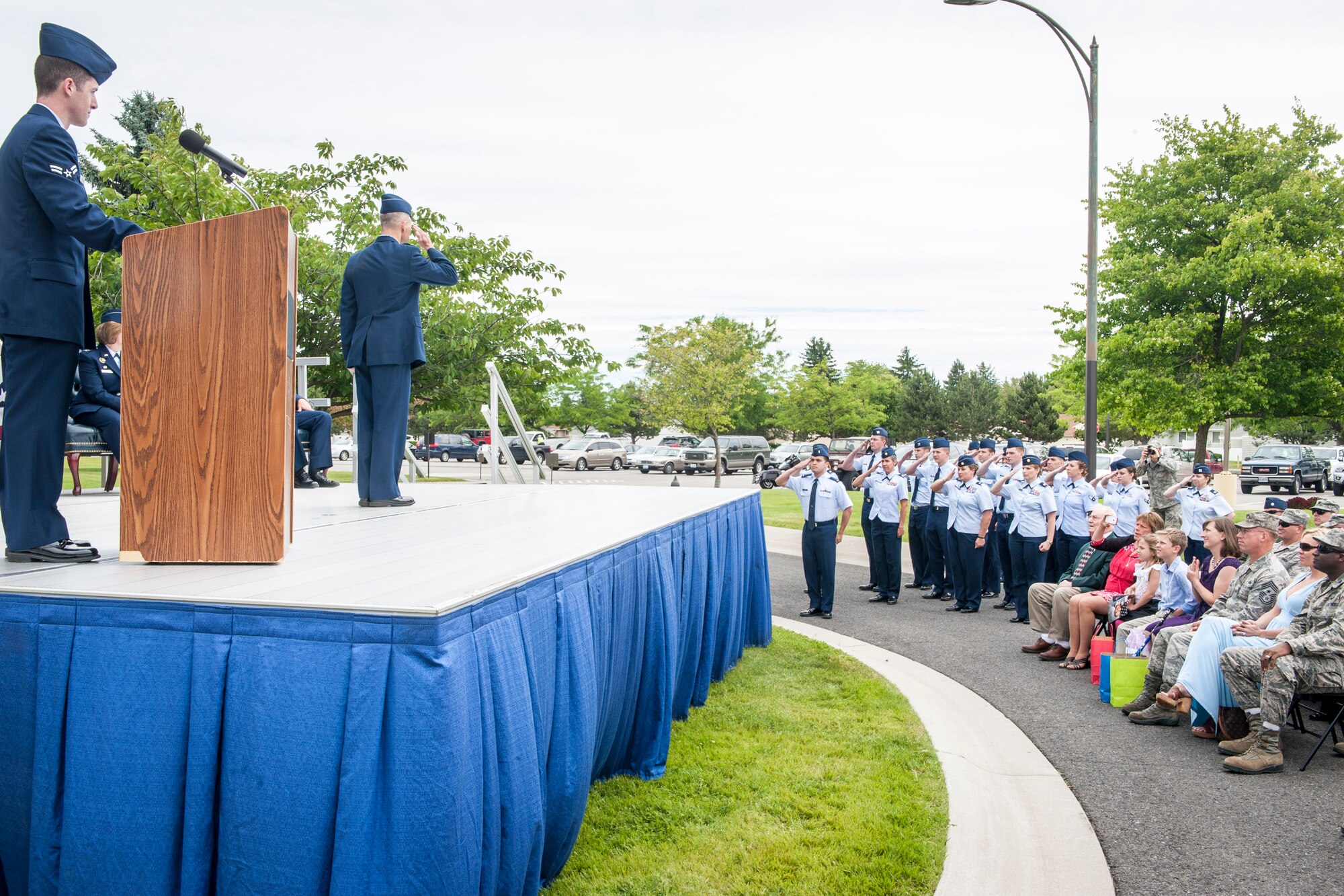 Lt. Col. Jason Lennen salutes members of the 92nd Medical Operations Squadron for the last time as their commander during the 92nd MDOS change of command ceremony at Fairchild Air Force Base, Wash., June 19, 2014. A change of command is a military tradition that represents a formal transfer and responsibility for a unit from one commanding officer to another. Lennen and his family leave Fairchild for the U.S. Air Force War College at Maxwell Air Force Base, Ala. (U.S. Air Force photo by Staff Sgt. Benjamin W. Stratton/Released)