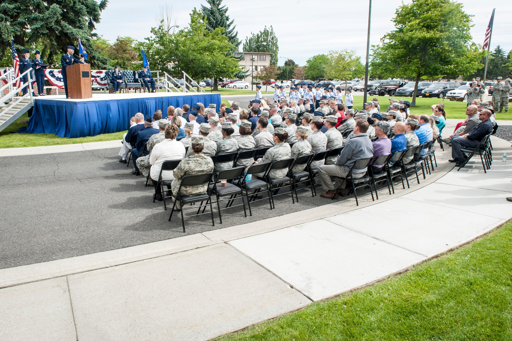Lt. Col. Jason Lennen thanks members of the 92nd Medical Operations Squadron, his family and Team Fairchild for their steadfast service and commitment during the 92nd MDOS change of command ceremony at Fairchild Air Force Base, Wash., June 19, 2014. A change of command is a military tradition that represents a formal transfer and responsibility for a unit from one commanding officer to another. Lennen and his family leave Fairchild as the 92nd MDOS commander for the U.S. Air Force War College at Maxwell Air Force Base, Ala. (U.S. Air Force photo by Staff Sgt. Benjamin W. Stratton/Released)