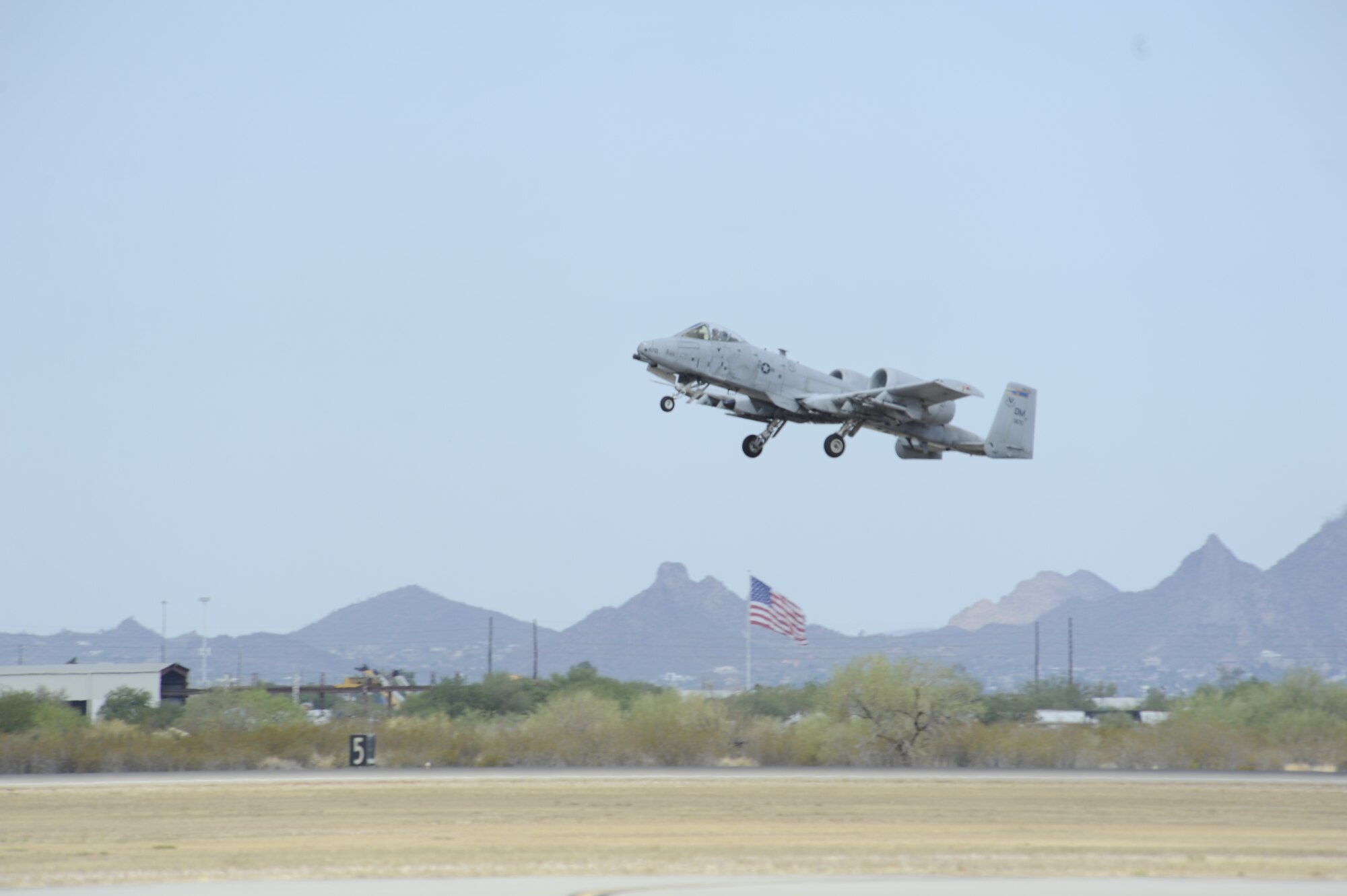 An A-10C Thunderbolt II takes off from Davis-Monthan Air Force Base, Ariz., June 18, 2014. D-M held an Operational Readiness Exercise, to test the bases’ Airmen on their ability to survive and operate in a deployed location. (U.S. Air Force photo by Airman 1st Class Betty R. Chevalier/Released)