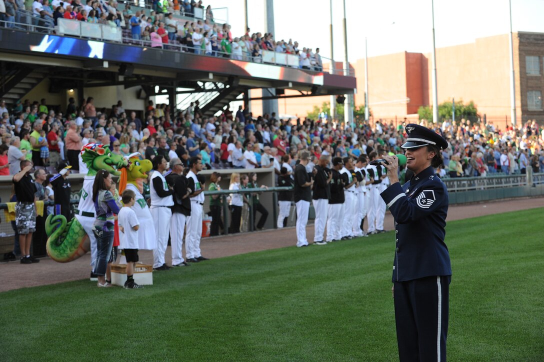 MSgt Alyson Jones performs the national anthem at Dayton's Fifth Third Stadium.  The stadium was hosting military members for Hometown Heroes military appreciation day.  MSgt Jones is a vocalist assigned to the USAF Band of Flight, stationed at Wright-Patterson AFB, Ohio.
