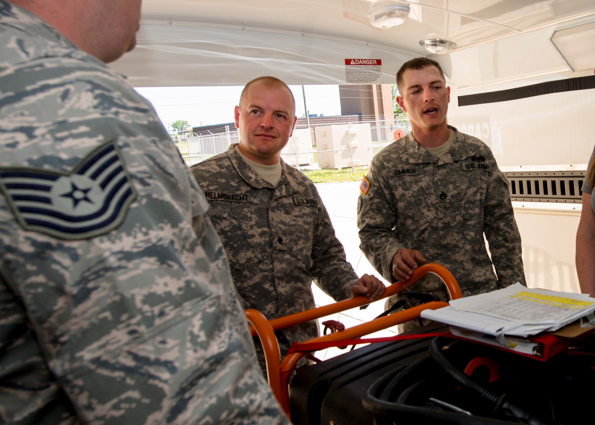 New York National Guard 2nd Squadron, 101st Cavalry members are instructed by 914th Airlift Wing personnel on how to weigh, measure and secure deployable equipment for airlift during a joint training exercise, June 07, 2014, Niagara Falls Air Reserve Station, NY. Exercises like this highlight the importance of interoperability between branches in a joint environment. (U.S. Air Force photo by Tech. Sgt. Joseph McKee)