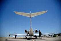 Capt. Richard Loesch III, 86th Flying Training Squadron instructor pilot, conducts a walk-around of the T-1A Jayhawk at the flight line on Laughlin Air Force Base, Texas, June 10, 2014. The T-1A has cockpit seating for an instructor and two students and is powered by twin turbofan engines, producing about 5,800 pounds of thrust, capable of an operating speed of 538 mph.  (U.S. Air Force photo/Staff Sgt. Steven R. Doty)(Released)