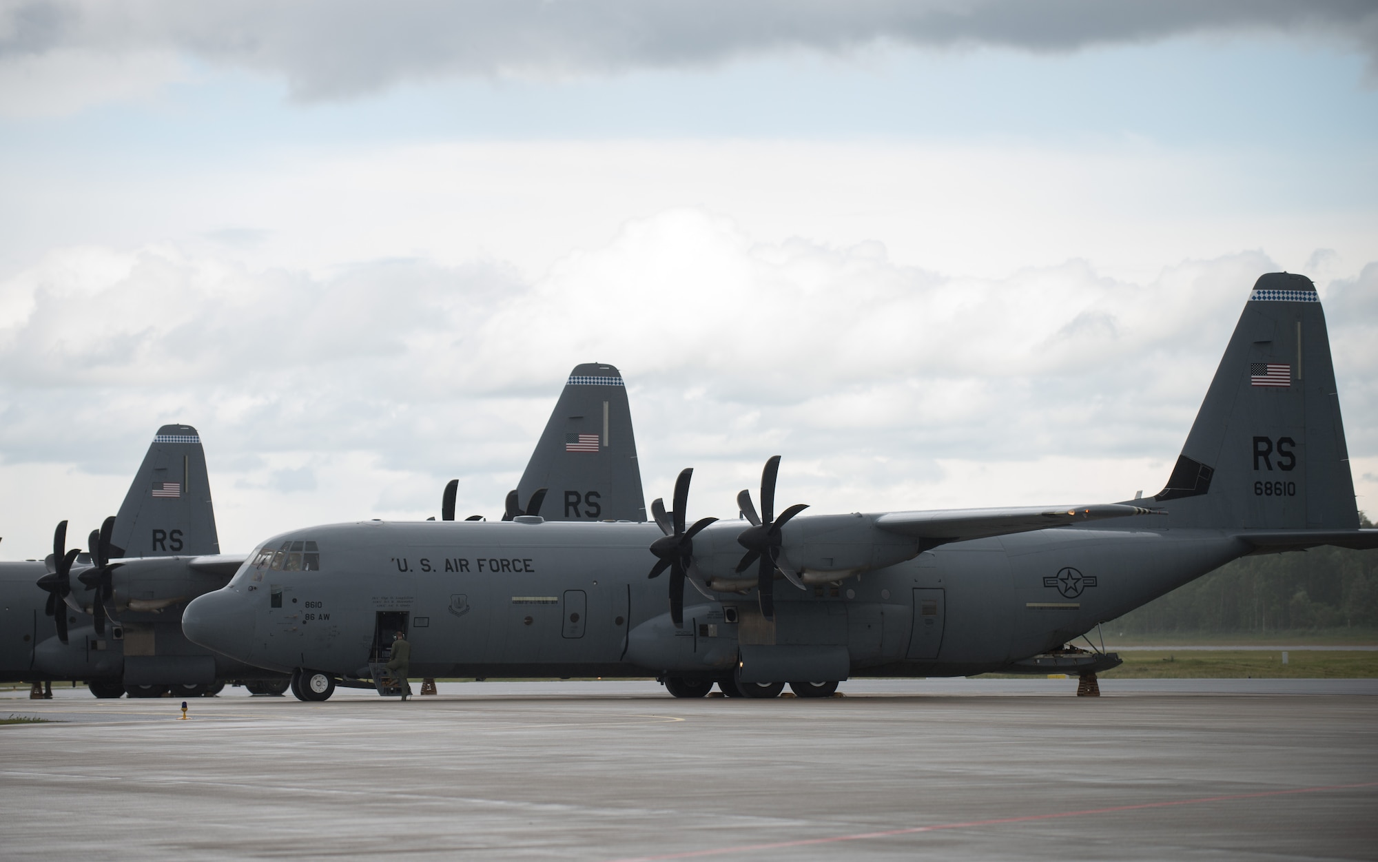 Three C-130 J-models are about to be unloaded at Lielvarde Air Base, Latvia, June 17, 2014 in part of the exercise Saber Strike 2014. In total, three 37th AS airframes landed on Lielvarde, making them the first ever U.S. Air Force aircraft to land on the runway. The 37th AS aircraft brought approximately 92 Airmen from the 435th Contingency Response Group and equipment needed to build a bare base during the Air Force-specific training. (U.S. Air Force photo/Senior Airman Jonathan Stefanko)