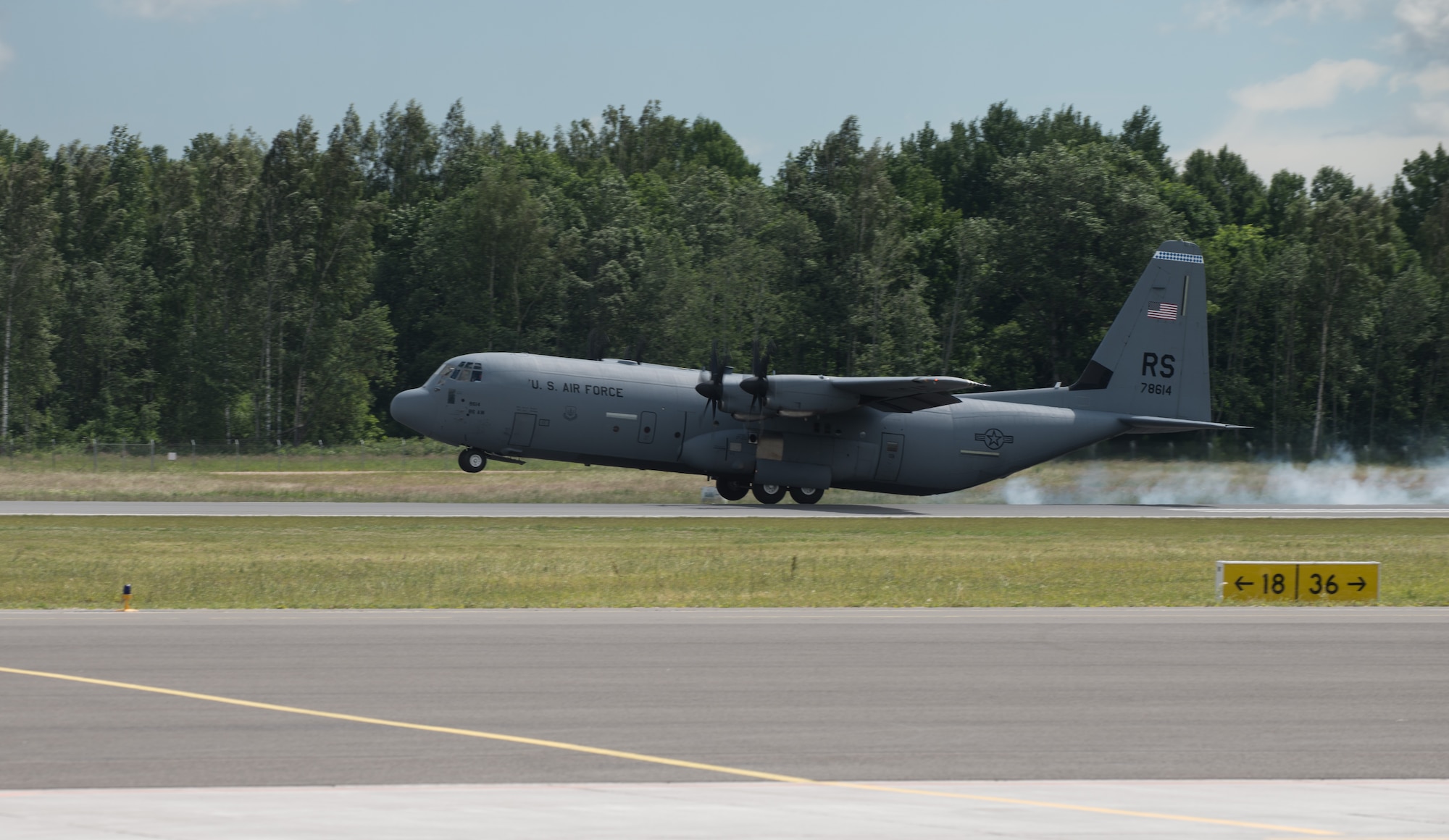 A C-130 J-model assigned to the 37th Airlift Squadron lands on Lielvarde Air Base, Latvia, June 17, 2014 in part of the exercise Saber Strike 2014. In total, three 37th AS airframes landed on Lielvarde, making them the first ever U.S. Air Force aircraft to land on the runway. The 37th AS aircraft brought approximately 92 Airmen from the 435th Contingency Response Group and equipment needed to build a bare base during the Air Force-specific training. (U.S. Air Force photo/Senior Airman Jonathan Stefanko)