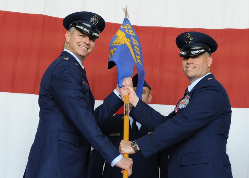 Lt. Col. John Vincent relinquishes command of the 39th Operations Squadron to Col. Craig Wills. 39th Air Base Wing commander, June 17, 2014, Incirlik Air Base, Turkey. Vincent will continue his Air Force career at Shaw Air Force Base, South Carolina. (U.S. Air Force photo by Staff sgt. Eboni Reams/Released)