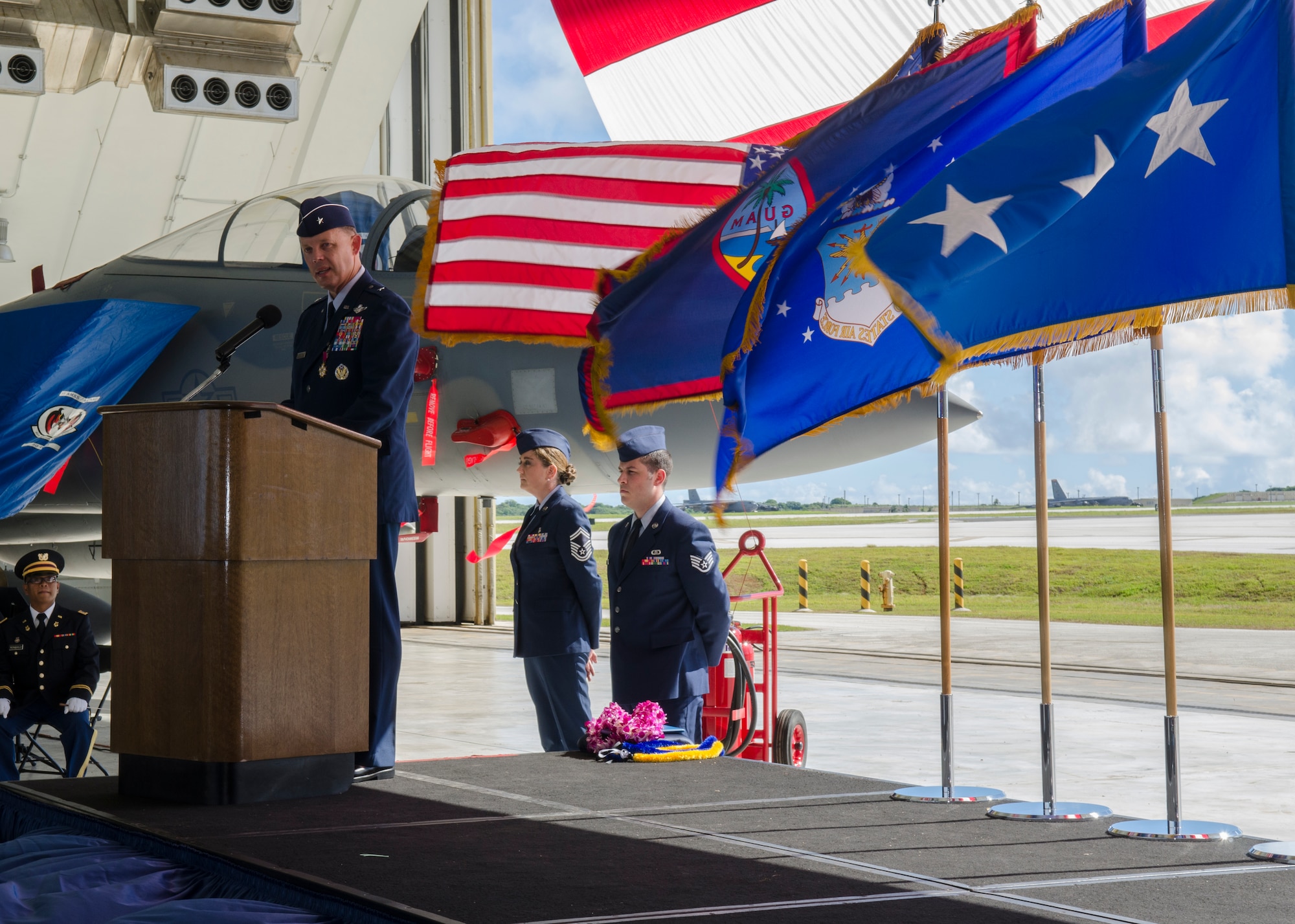 Brig. Gen.  Steven Garland addresses Team Andersen for the last time as the 36th Wing commander during the Wing change of command ceremony June 19, 2014, on Andersen Air Force Base, Guam.  Garland relinquished command to Brig. Gen. Andrew Toth, who was previously stationed at Joint Base San Antonio-Randolph, Texas.  (U.S. Air Force photo by Senior Airman Katrina M. Brisbin/Released)