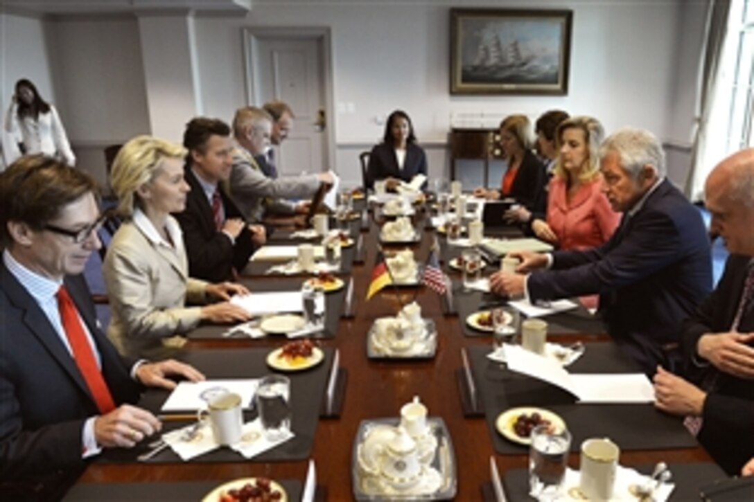 U.S. Defense Secretary Chuck Hagel, center right, meets with German Defense Minister Ursula von der Leyen, center left, at the Pentagon, June 19, 2014. The two leaders met to discuss matters of mutual national interest in the European region. 