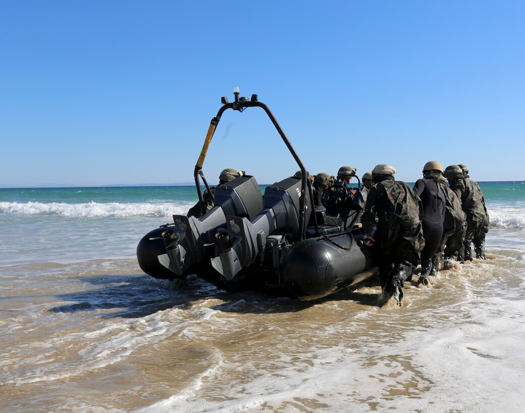 U.S. Marines of Special-Purpose Marine Air-Ground Task Force Crisis Response, Third Battalion Eight Marines, 2nd Platoon, Kilo Company, participate in a bilateral training exercise involving beach landing craft with the Spanish Marines in Sierra Del Retin, Spain, June 2, 2014. The bilateral training was conducted to further partnerships between SP-MAGTF CR and the European forces. (U.S. Marine Corps photo by Lance Cpl. Alexander Hill/Released)