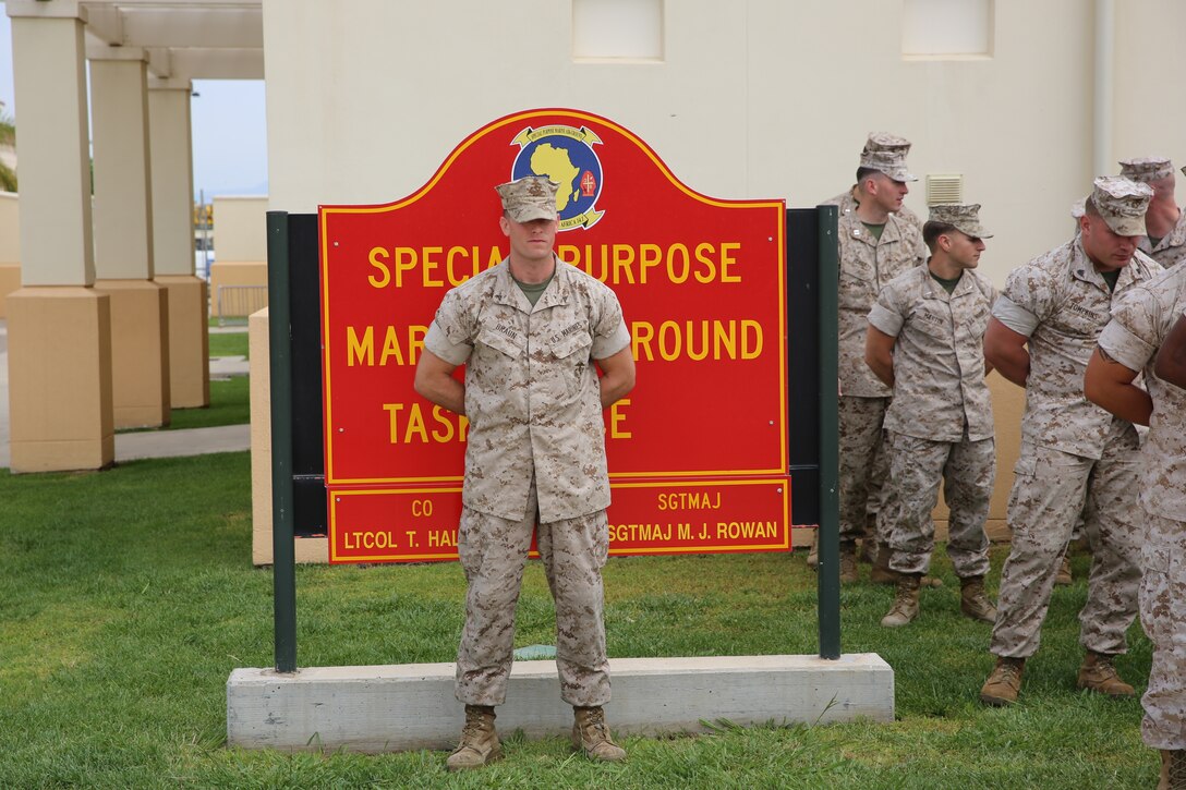 Corporal Joshua Braun, a ground radio technician with Special-Purpose Marine Air-Ground Task Force Africa 14, stands at parade rest during his promotion ceremony, June 2, 2014. Braun was meritoriously promoted to his present rank.