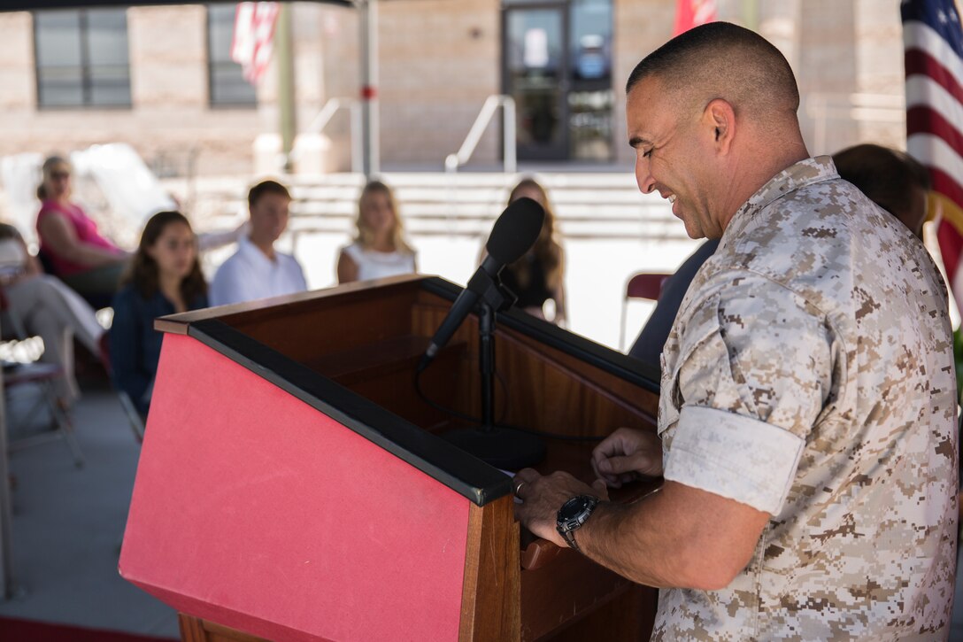 Sgt. Maj. Richard Charron, Marine Corps Air Station Miramar sergeant major, gives his opening remarks before presenting scholarships at the Defense Commissary Agency and the Fisher House Foundation Scholarship award ceremony aboard MCAS Miramar, Calif., June 19. Winners of the scholarship submitted essays about the difficulties military families face as a requirement for the scholarship. 