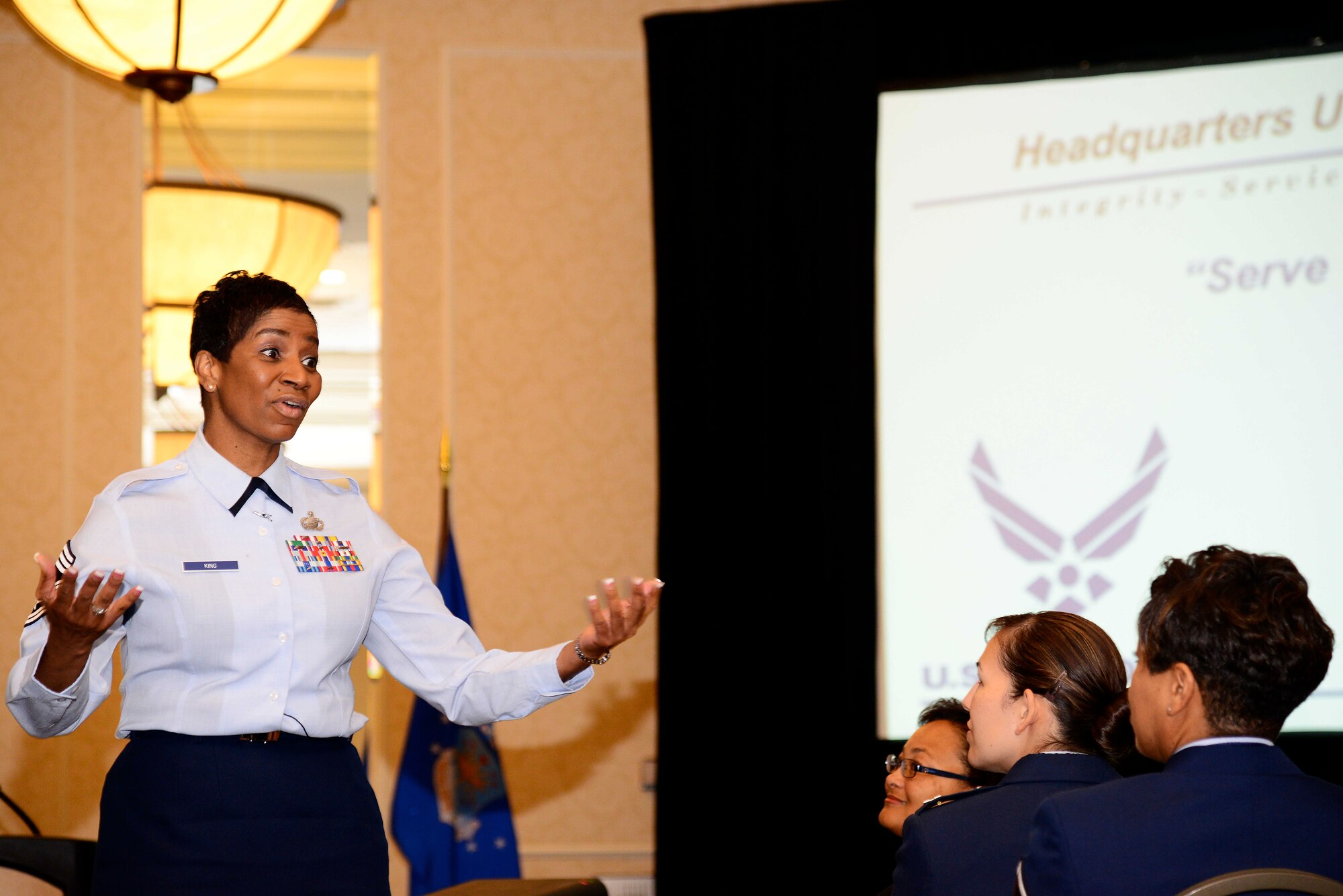 Chief Master Sgt. Trae King shares her personal experiences in a “Leaders Who Serve” discussion panel at the 27th Annual Joint Women’s Leadership Symposium June 13, 2014, in Norfolk, Va. More than 100 Airmen from across the world attended the symposium. The two-day event, themed “Why Do We Serve,” offered opportunities for personal and professional development with a focus on leadership, while also highlighting the achievements of female leaders who continue to break barriers and achieve greater success around the world. King is the 633rd Air Base Wing command chief. (U.S. Air Force photo/Staff Sgt. Antoinette Gibson)