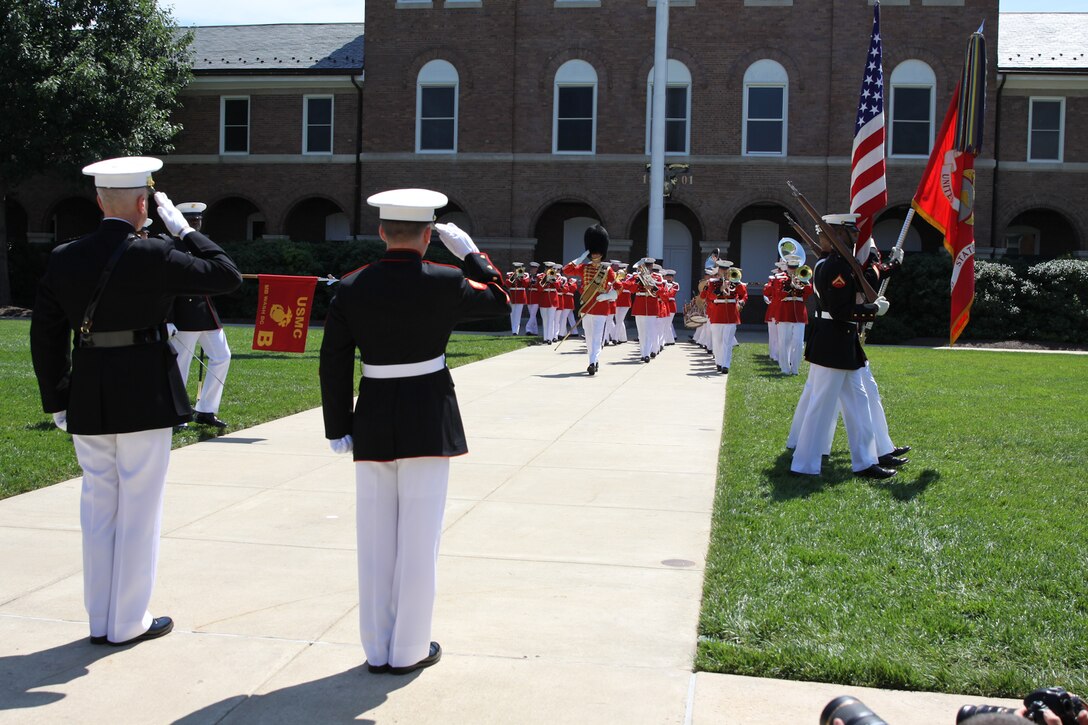 On June 20, 2014, Commandant of the Marine Corps Gen. James Amos presented Medal of Honor recipient Cpl. Kyle Carpenter with the Medal of Honor flag at a special ceremony at Marine Barracks Washington, D.C. (U.S. Marine Corps photo by Master Sgt. Kristin duBois/released)