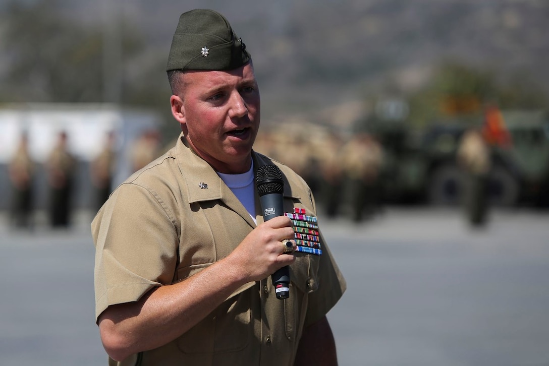 Lieutenant Col. Colin Smith, the commanding officer of 1st Combat Engineer Battalion, 1st Marine Division, gives his remarks to family and friends at the 1st CEB change of command ceremony aboard Camp Pendleton, Calif., June 18, 2014. Smith is returning to 1st CEB after serving as the commanding officer of Company C more than a decade ago.