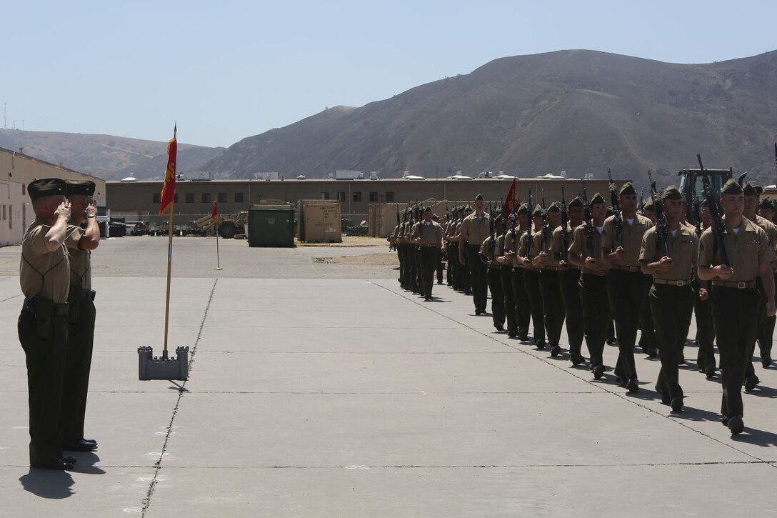 Lieutenant Col. Andrew Winthrop, the former commanding officer of 1st Combat Engineer Battalion, 1st Marine Division, and Lt. Col. Colin Smith, the commanding officer of 1st CEB, 1st Marine Division, inspect the troops in a pass and review at the 1st CEB change of command ceremony aboard 
Camp Pendleton, Calif., June 18, 2014. Winthrop served as commanding officer of 1st CEB for 18 months.