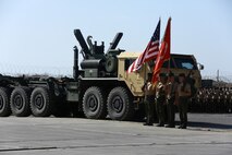 Marines with 1st Light Armored Reconnaissance Battalion, 1st Marine Division, I Marine Expeditionary Force, march on the colors during a change of command ceremony aboard Camp Pendleton, Calif., June 19, 2014. During the ceremony, Lt. Col. Gilbert D. Juarez relinquished command of the Highlanders to Lt. Col. Christian M. Rankin. (U.S. Marine Corps photo by Lance Cpl. Anna Albrecht)