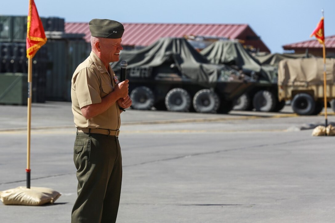 Major Gen. Lawrence Nicholson, Commanding General, 1st Marine Division, I Marine Expeditionary Force, addresses Marines, sailors, friends and family during 1st Light Armored Reconnaissance Battalion’s change of command ceremony aboard Camp Pendleton, Calif., June 19, 2014. During the ceremony, Lt. Col. Gilbert D. Juarez relinquished command of the Highlanders to Lt. Col. Christian M. Rankin. (U.S. Marine Corps photo by Lance Cpl. Anna Albrecht)