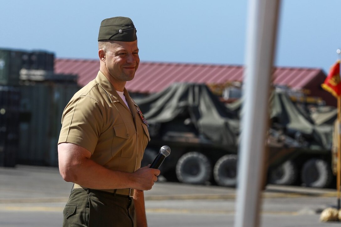 Lieutenant Col. Christian M. Rankin, commanding officer of 1st Light Armored Reconnaissance Battalion, 1st Marine Division, I Marine Expeditionary Force, addresses Marines, sailors, friends and family during a change of command ceremony aboard Camp Pendleton, Calif., June 19, 2014. During the Ceremony, Lt. Col. Gilbert D. Juarez relinquished command of the Highlanders to Rankin. (U.S. Marine Corps photo by Lance Cpl. Anna Albrecht)