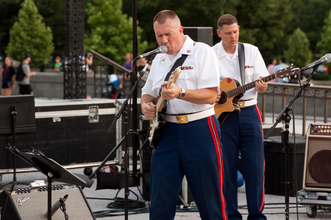 Gunnery Sergeants Alan Prather and Brian Turnmire perform with Free Country, the Marine Band's contemporary country music ensemble, on the west steps of the U.S. Capitol. (U.S. Marine Corps photo by Staff Sgt. Brian Rust/released)