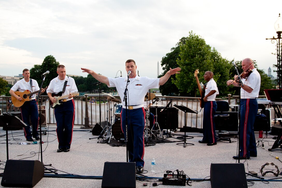 Free Country, the Marine Band's contemporary country music ensemble, on the west steps of the U.S. Capitol; L to R: Gunnery Sgt. Brian Turnmire, Gunnery Sgt. Alan Prather, Master Sgt. Kevin Bennear, Master Sgt. Aaron Clay, and Master Gunnery Sgt. Peter Wilson. (U.S. Marine Corps photo by Staff Sgt. Brian Rust/released)