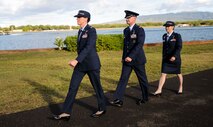 Col. Virgina Garner, 15th Medical Group commander, left, Lt. Col. Michael Fea, former 15th Medical Operations Squadron commander, center,  and Lt. Col. Jennifer Vecchione, incoming 15th MDOS commander, right, march to their change of command ceremony at the Missing Man Formation on Joint Base Pearl Harbor-Hickam, Hawaii, June 20, 2014. (U.S. Air Force photo/Tech. Sgt. Terri Paden)