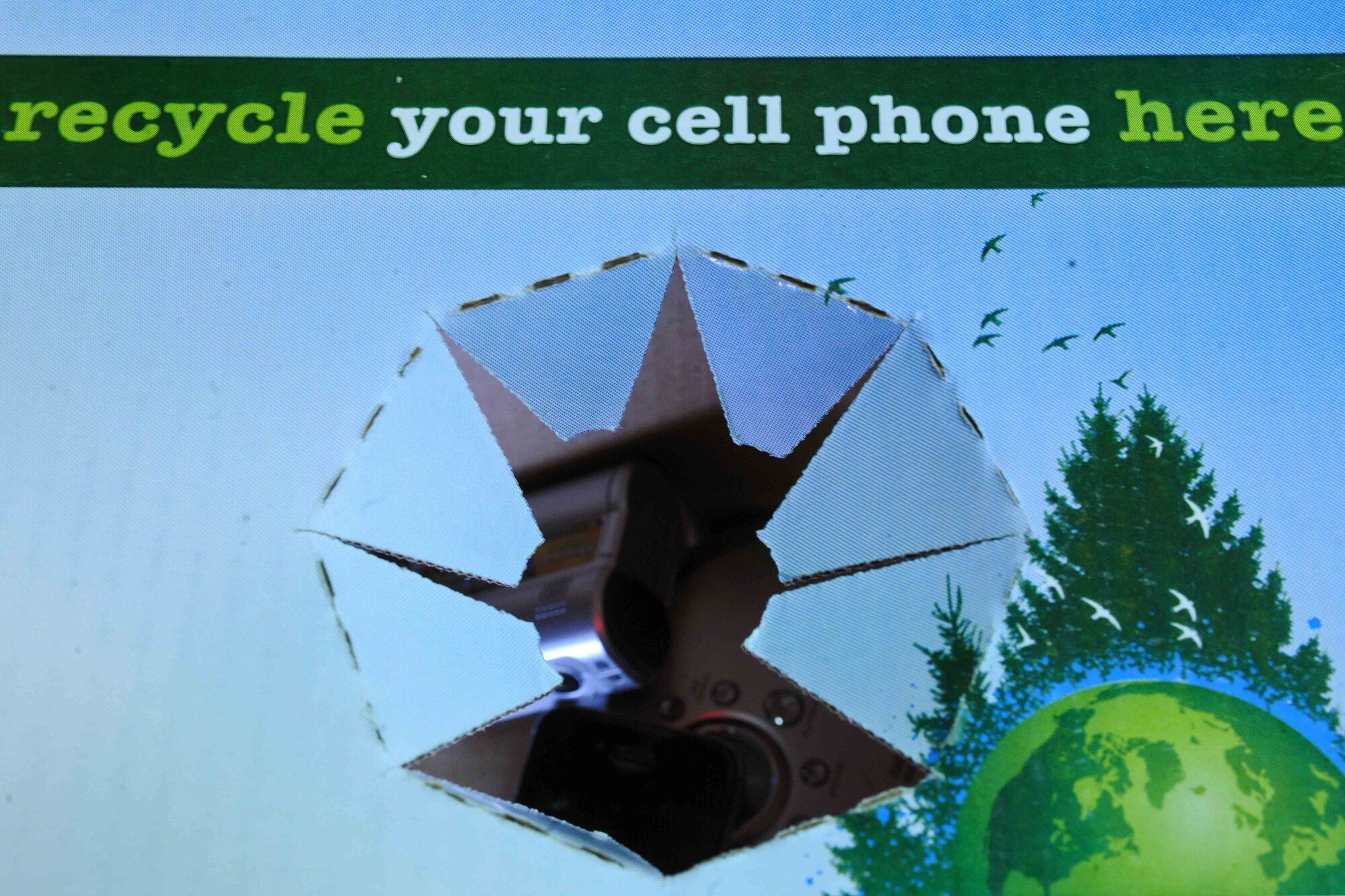 ALTUS AIR FORCE BASE, Okla. -- The Sexual Assault Prevention and Response (SAPR) office is recycling unwanted cell phones and small electronics to provide donations to domestic violence and sexual assault shelters. The program sends boxes of cell phones to a cellular recycler and will provide the donations to the Colorado Coalition for domestic violence and sexual assault, as well as other shelters. (U.S. Air Force photo by Senior Airman Jesse Lopez/Released)