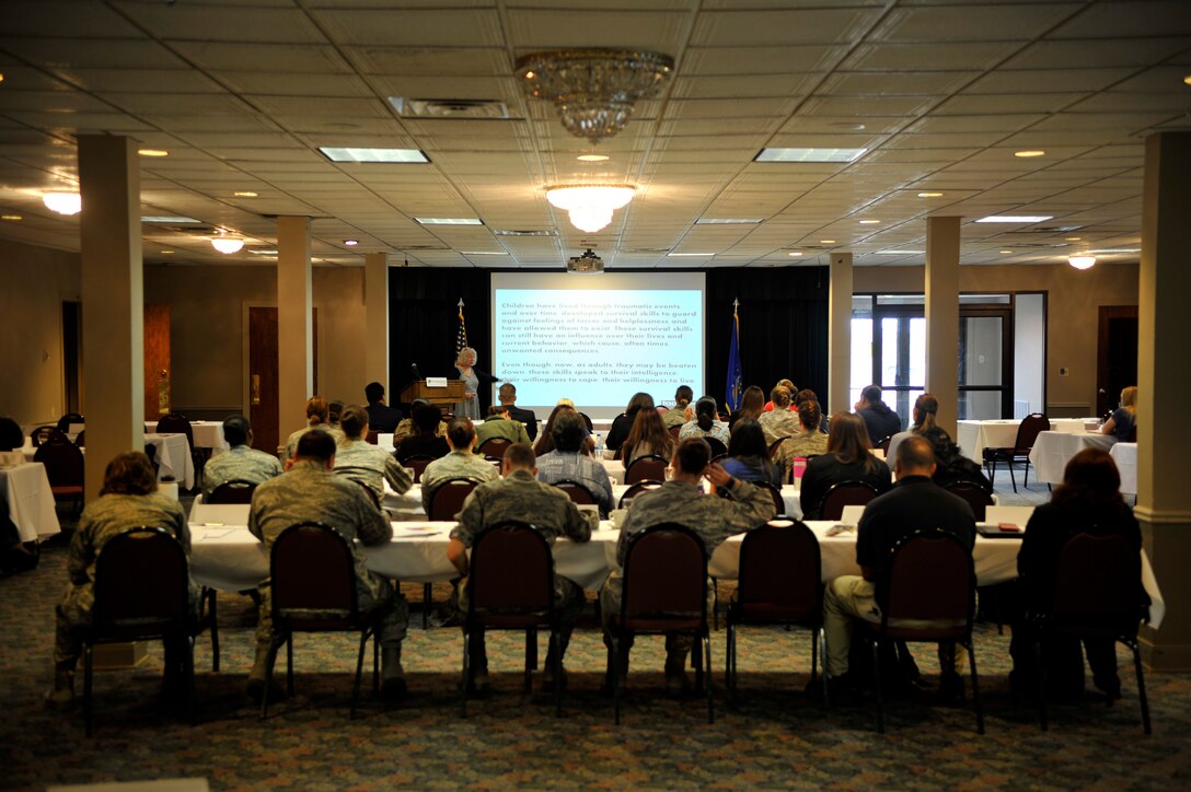 Wende Hilsenrod, Texas Association Against Sexual Assault training and human trafficking specialist, speaks to attendees about child responses to traumatic events at the Sexual Assault Response training in Club XL on Laughlin Air Force Base, Texas, June 19, 2014. TAASA has provided statewide and regional trainings and conferences to over 100,000 Texans and provided over 6 million educational materials through rape crisis centers and community partners free of charge. (U.S. Air Force photo/Staff Sgt. Steven R. Doty)(Released)