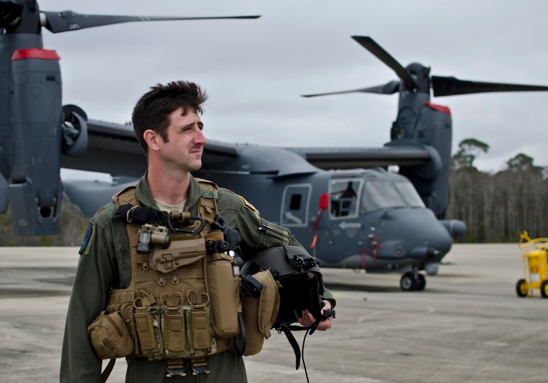 Maj. Nick Noreus, 8th Special Operations Squadron CV-22 Osprey pilot, walks on the flightline at Hurlburt Field, Fla., March 3, 2014. Noreus said he is hopeful that his training and experience will make him a prime candidate to go to Mars. (U.S. Air Force photo/Staff Sgt. John Bainter)