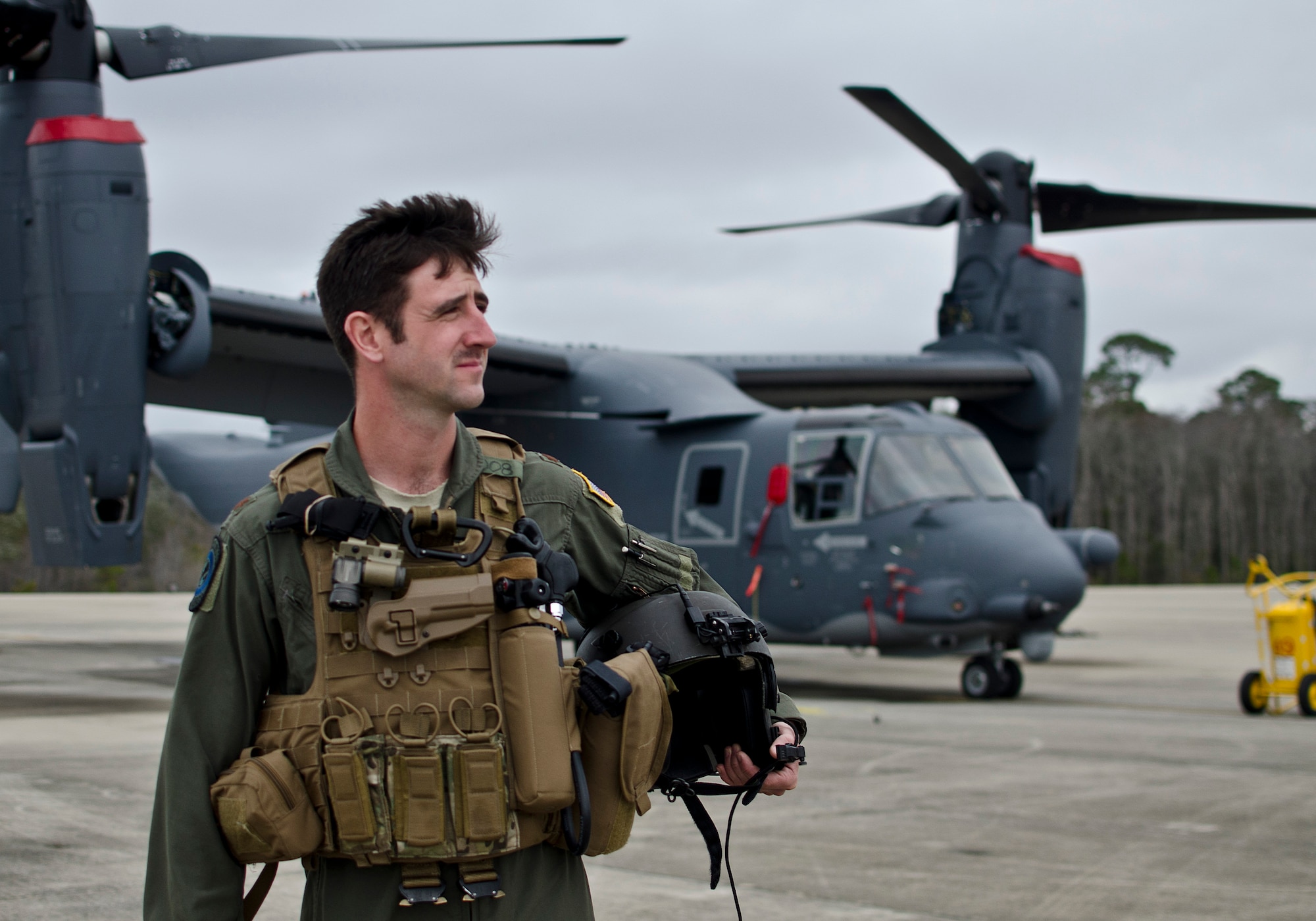 Maj. Nick Noreus, 8th Special Operations Squadron CV-22 Osprey pilot, walks on the flightline at Hurlburt Field, Fla., March 3, 2014. Noreus said he is hopeful that his training and experience will make him a prime candidate to go to Mars. (U.S. Air Force photo/Staff Sgt. John Bainter)