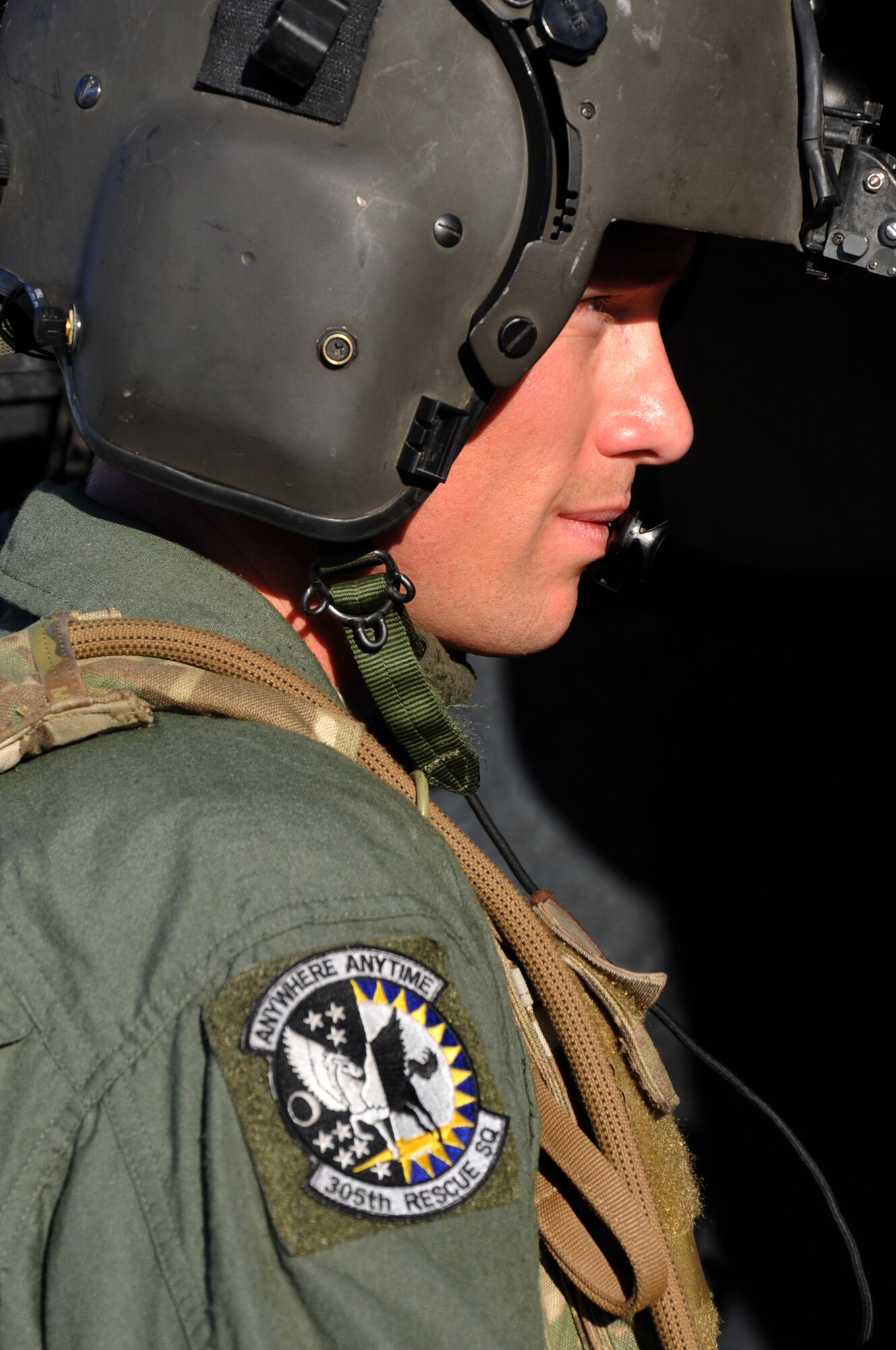 Tech. Sgt. Caleb Hiner, a special missions aviator for the 305th Rescue Squadron, Davis-Monthan Air Force Base, Ariz., communicates with his crew mates about the upcoming air-refueling exercise June 19, 2014. Hiner will be flying on an HH-60G Pave Hawk helicopter that is capable of flying up to 504 nautical miles. (U.S. Air Force photo/Senior Airman Natasha Dowridge)