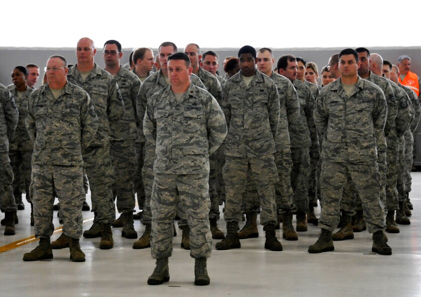 Maj. Paul Needham stands in front of the 288th Operations Support Squadron during a Conversion Day ceremony held at Ebbing Air National Guard Base, Fort Smith, Arkansas, June 7, 2014. Needham took command of the newly activated 288th OSS during the ceremony. The 188th Fighter Wing was redesignated as the 188th Wing during the event. The ceremony also recognized the many changes occurring at the wing as a result of its conversion to a remotely piloted aircraft (MQ-9 Reapers) and intelligence, surveillance and reconnaissance mission. (U.S. Air National Guard photo by Airman 1st Class Cody Martin)