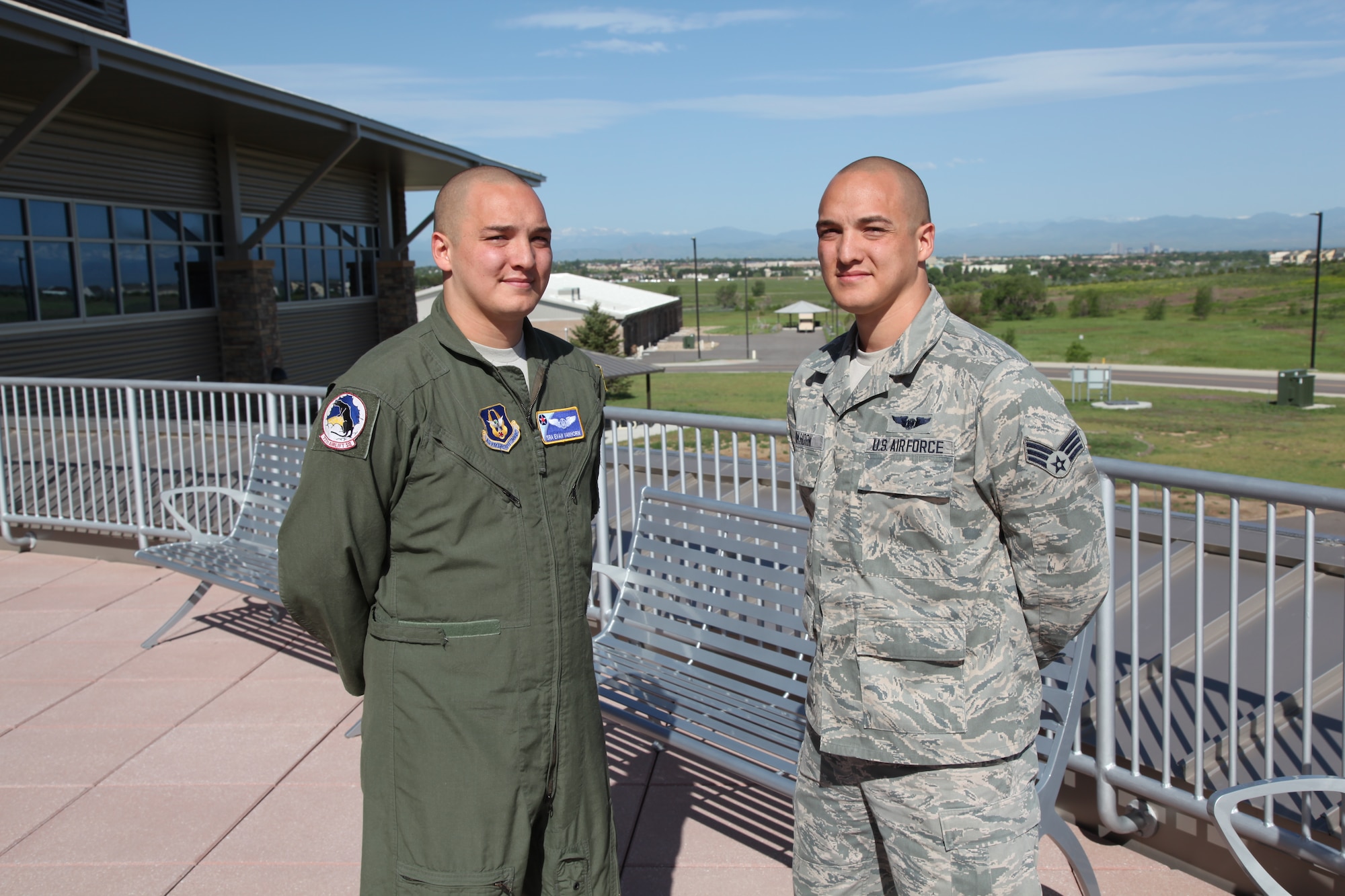Senior Airmen Evan and Adam Van Horn stand outside the Air Reserve Personnel Center headquarters building June 17, 2014, on Buckley Air Force Base, Colo. Members at the Air Reserve Personnel Center have been seeing double since Senior Airmen Evan and Adam Van Horn were assigned here. Although the twins are fraternal, it’s difficult to tell them apart. Their journey began in May when Evan began working as a points management agent on Reserve Personnel Appropriation orders here. (U.S. Air Force photo/Tech. Sgt. Rob Hazelett)