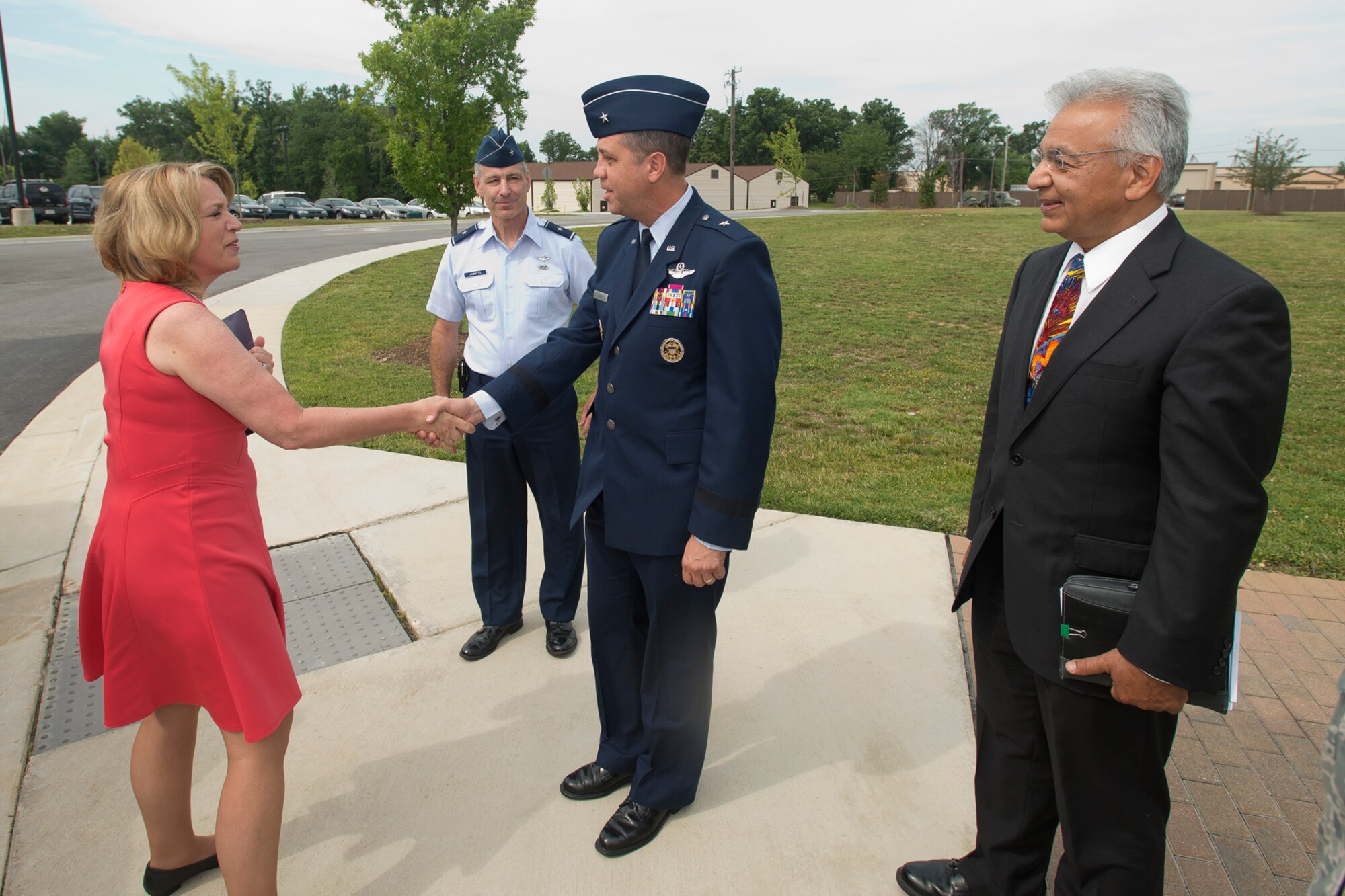 Secretary of the Air Force Deborah Lee James is greeted by Brig. Gen. Michael R. Taheri, commander of the Air National Guard Readiness Center, Brig. Gen. at Joint Base Andrews, Md., June 19, 2014. Secretary James addressed Air and Army National Guard commanders attending the Commander's Development Course and discussed current issues and future challenges facing the total force. (U.S. Air National Guard photo by Master Sgt. Marvin R. Preston/Released)