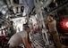 Airmen prepare a C-130J Super Hercules aircraft for patient transportation at Bagram Airfield. . The unit uses fixed-wing aircraft such as the C-130J Super Hercules, which allows larger patient loads, long-distance transportation and a greater ability to care for injured members (Air Force photo).  