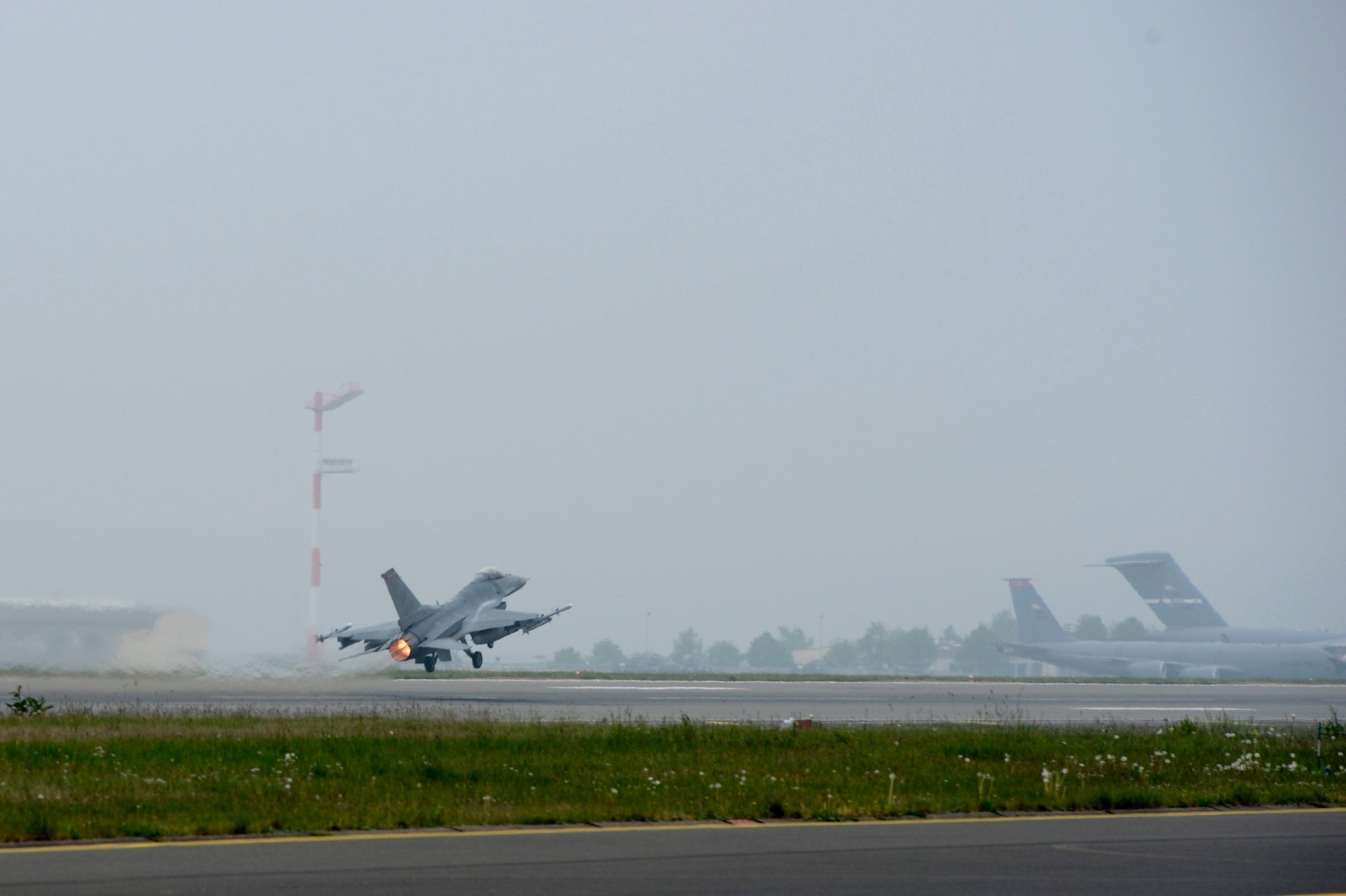 U.S. Air Force Capt. Jason Kiggins, 480th Fighter Squadron flight commander from Largo, Fla., soars off the runway at Spangdahlem Air Base, Germany, April 30, 2014. Aircraft from the 480th FS are heading to the U.S. Air Force Aviation Detachment, 52nd Operations Group, Lask Air Base, Poland. The 52nd Fighter Wing’s forward-based, ready forces provide timely, decisive airpower to meet emerging challenges.(U.S. Air Force photo by Staff Sgt. Christopher Ruano/Released)